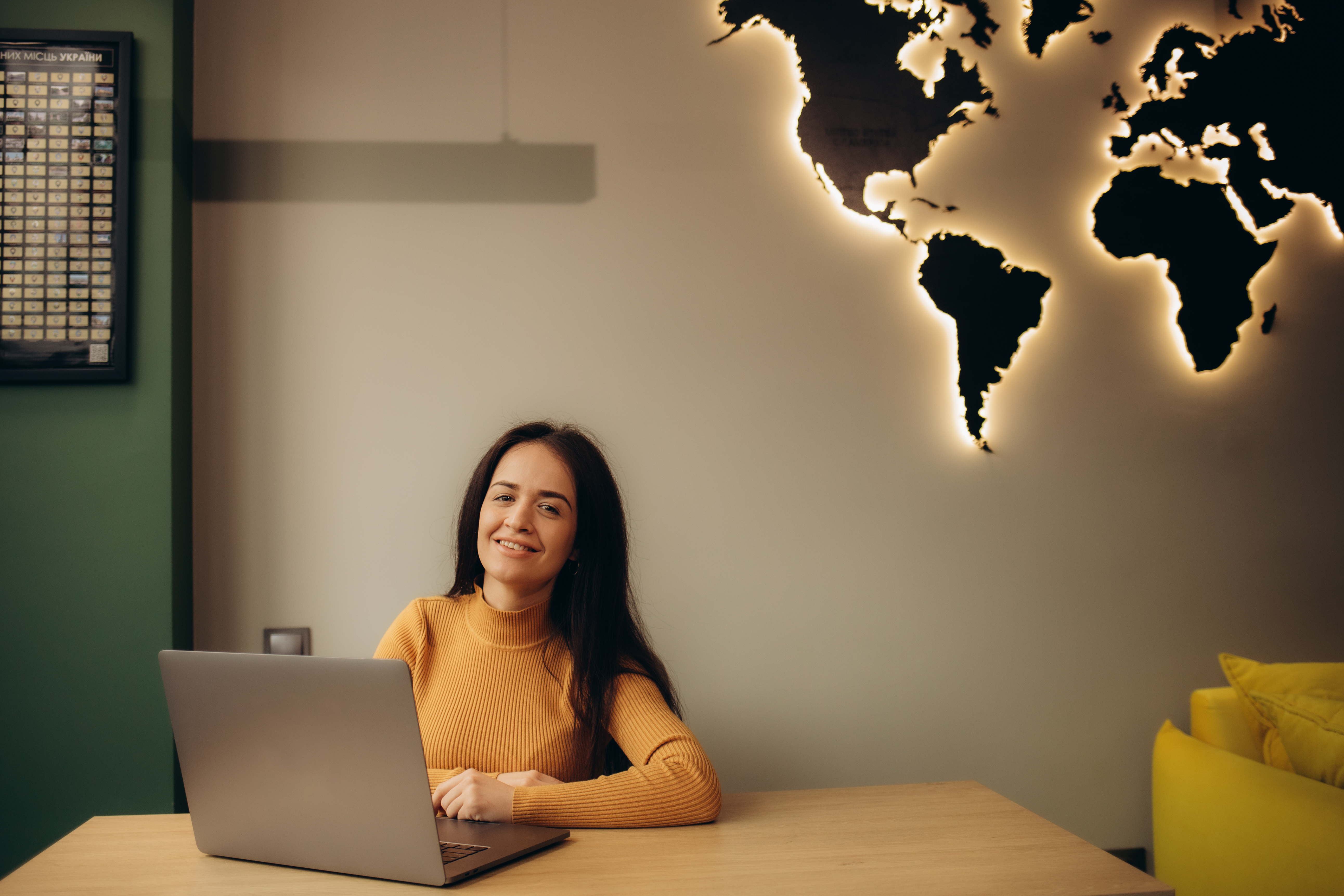 portrait of a female travel agent in the office of 51f6249ab0ae154337c8