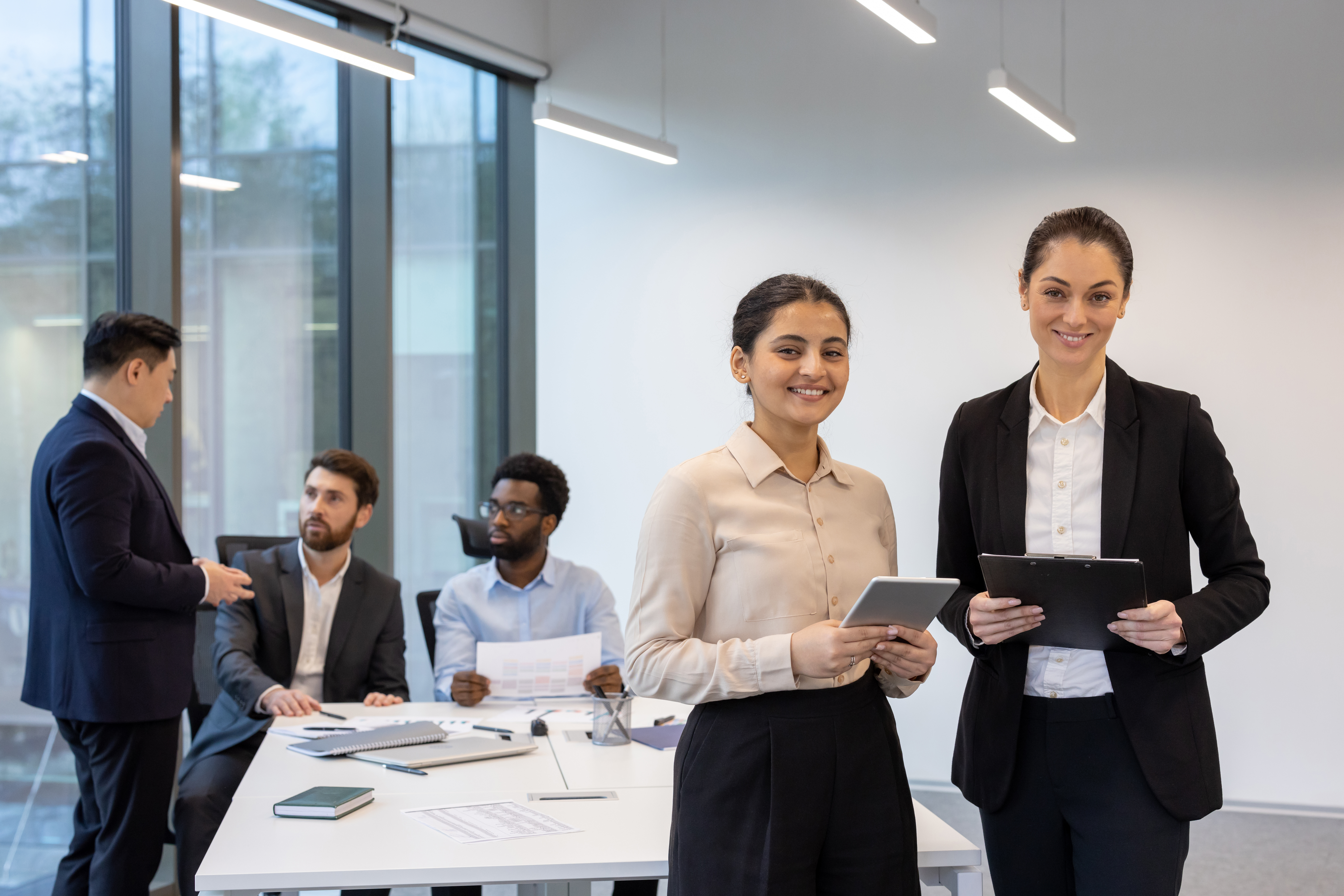 portrait of a group of people two successful busi 8c12e6f7b03e576371a5