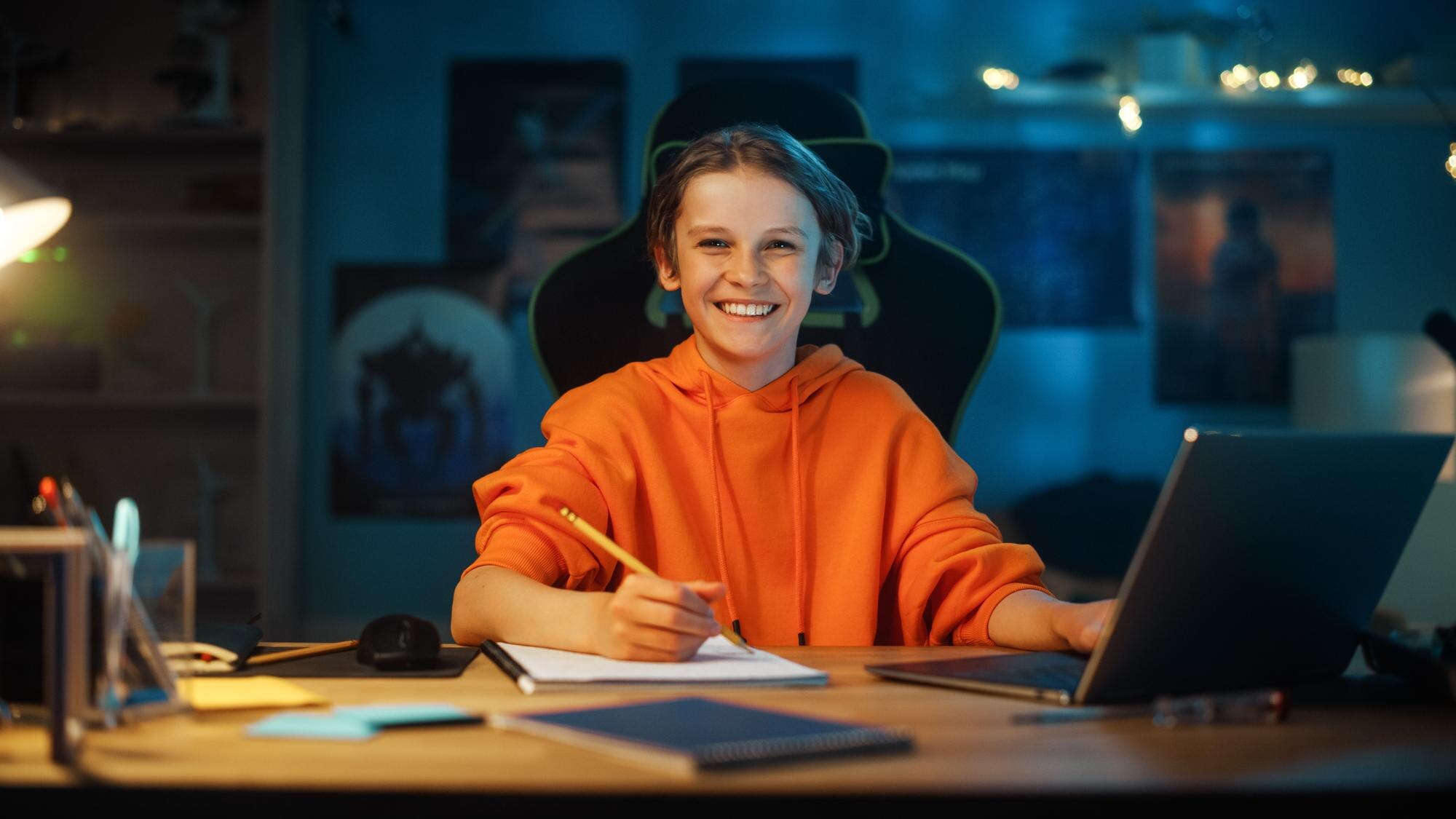 Portrait Of A Smart Young Boy In Orange Sweatshirt 4768a460b5cd04b4f82f