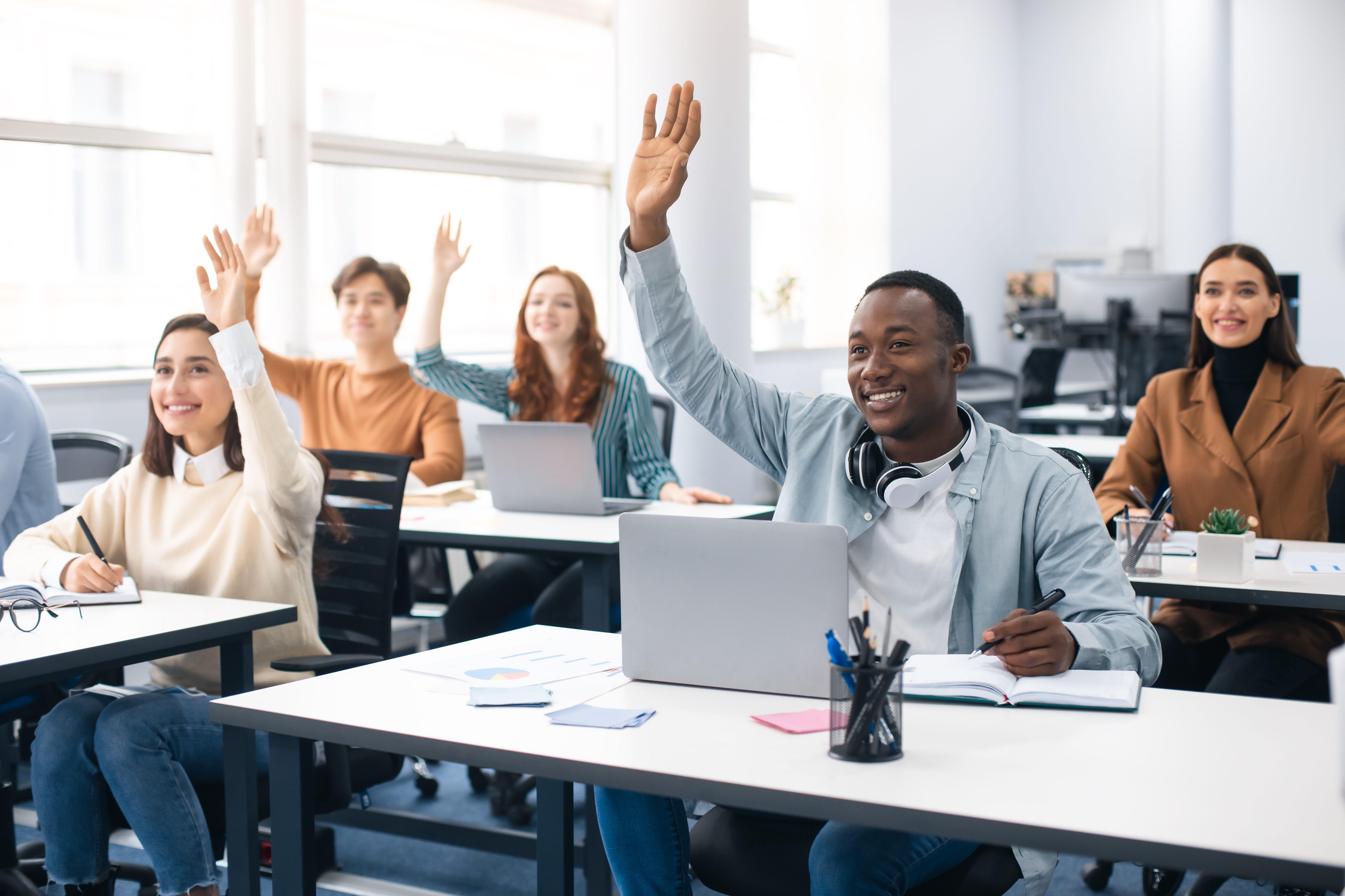 Image of a group of adult students in the classroom. Illustrative image to reflect confidence in candidates OET preparation - #The best OET preparation course.