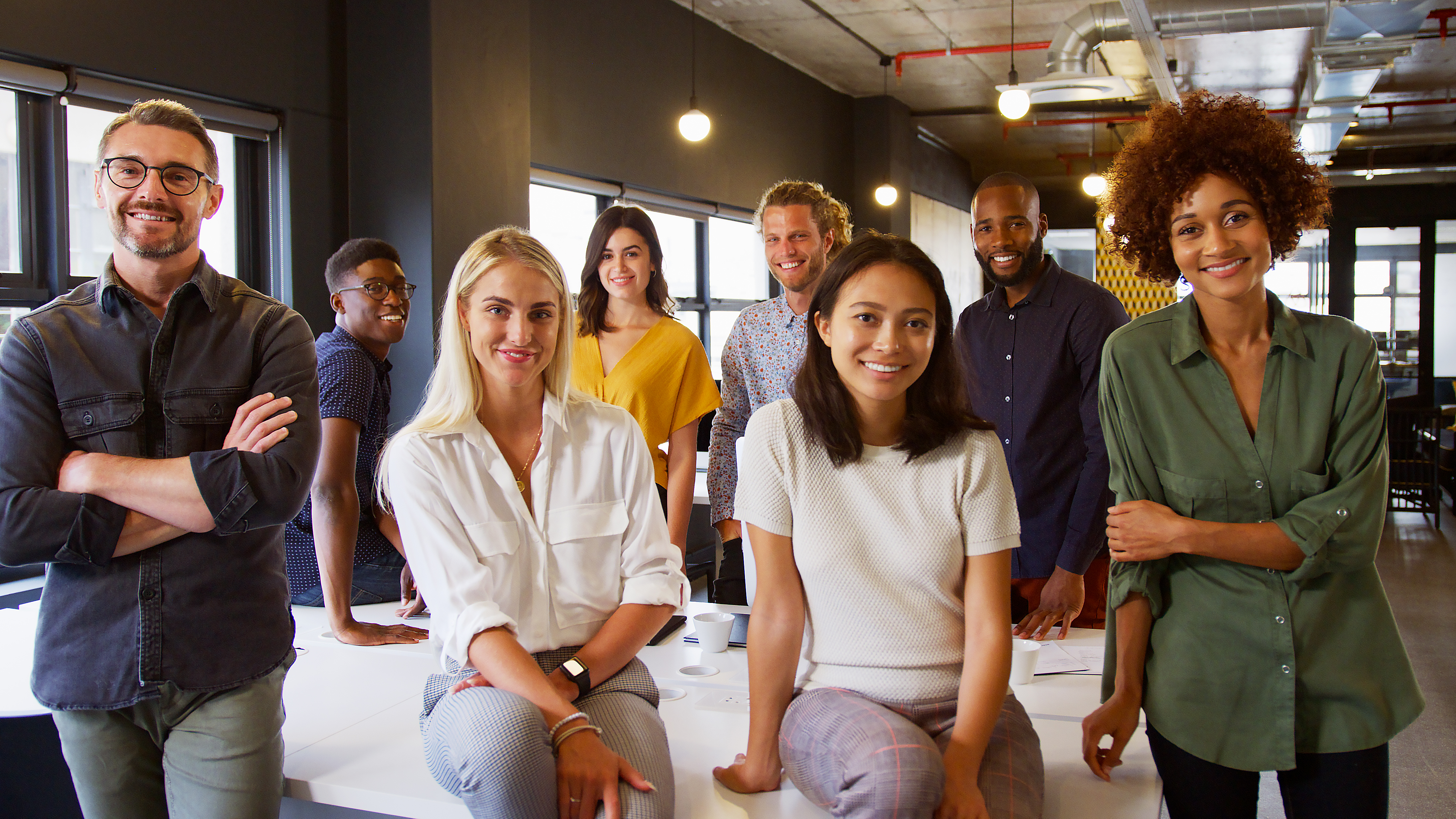 portrait of smiling multi cultural business team i 9f34d3d06ca48c81ef53