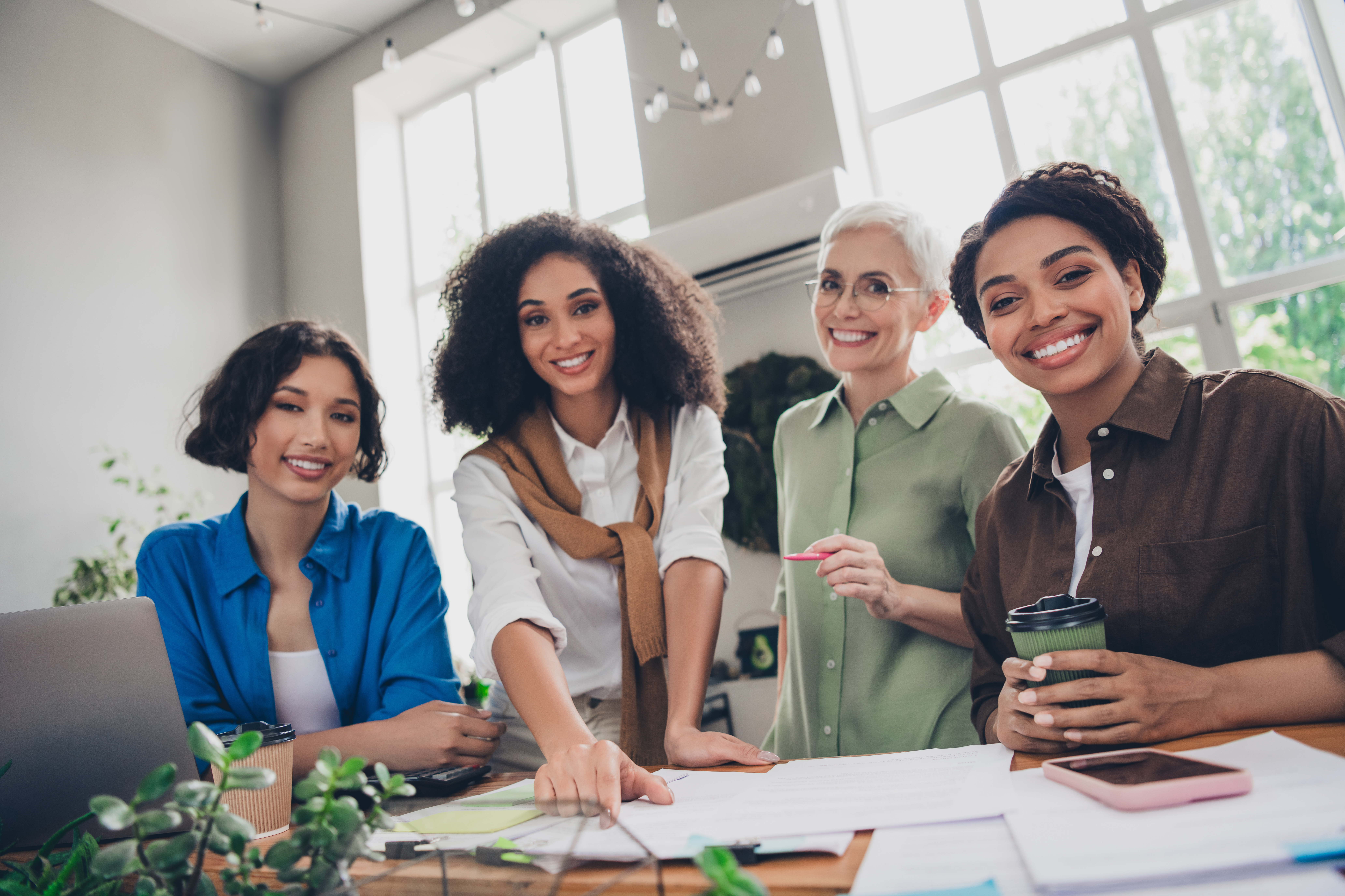 portrait of team ambitious business women smile co ca509f357ca34d9cee15