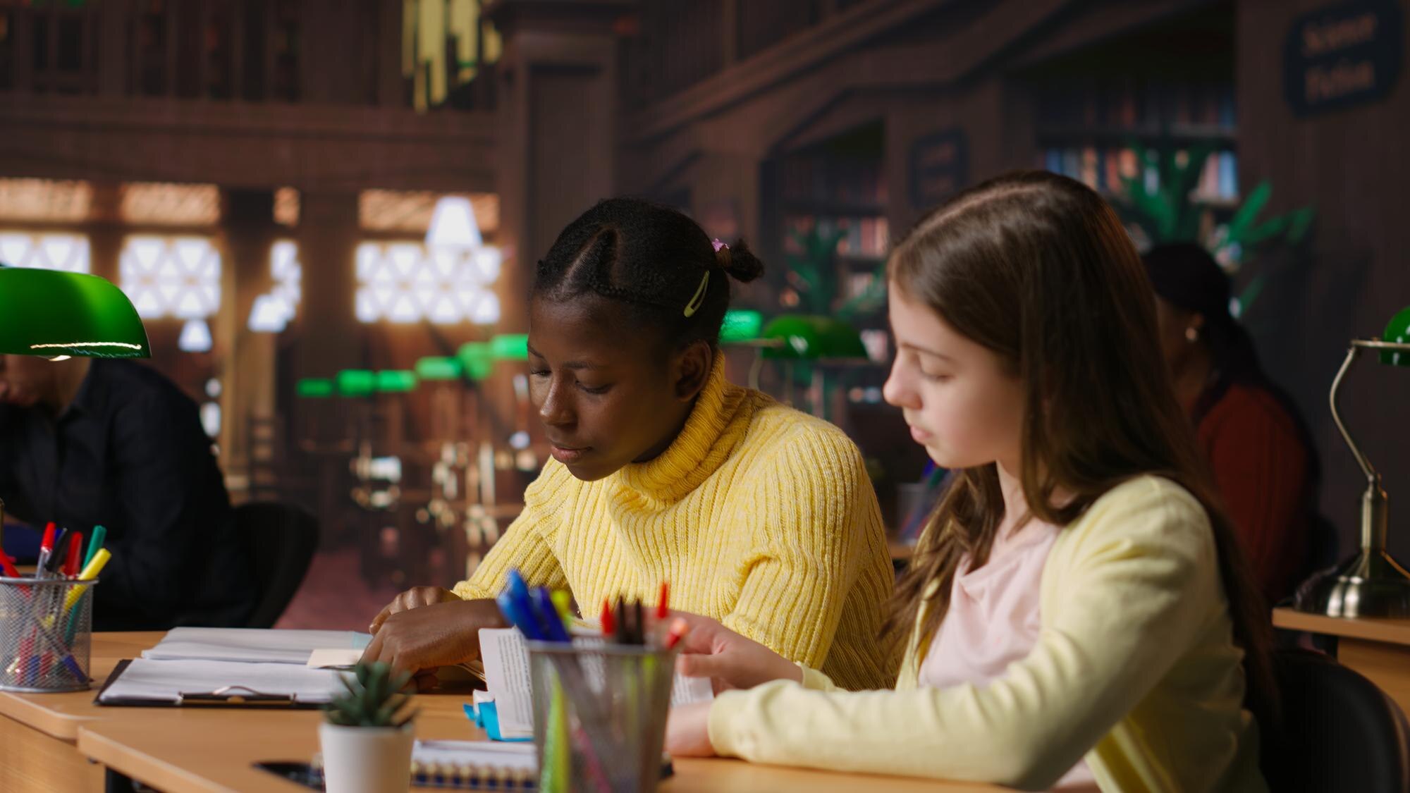 Preteen Girls Focus On Reading The Required Books 9d987ffff95a529d318a