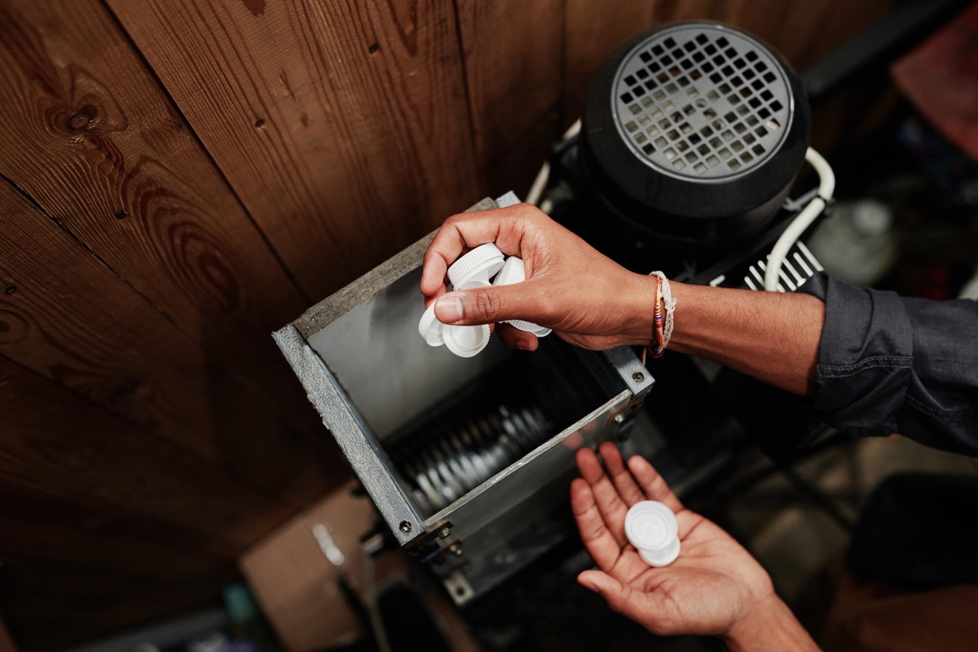 How Vacuum Forming Enhances Custom Plastic Product Design and Functionality 1 processing white plastic bottle caps 93c1bb0ba20e44c2ddf2