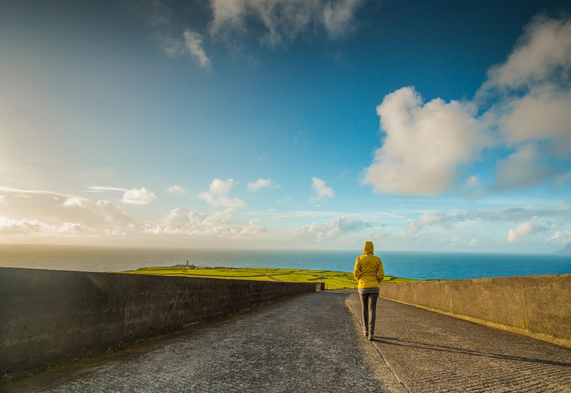 Be Self Driven: Fresh Travel Inspiration for UK, Ireland & Greece Adventures 4 rear view of man walking on road leading towards s 34786fd5668410cac492 BTOURS