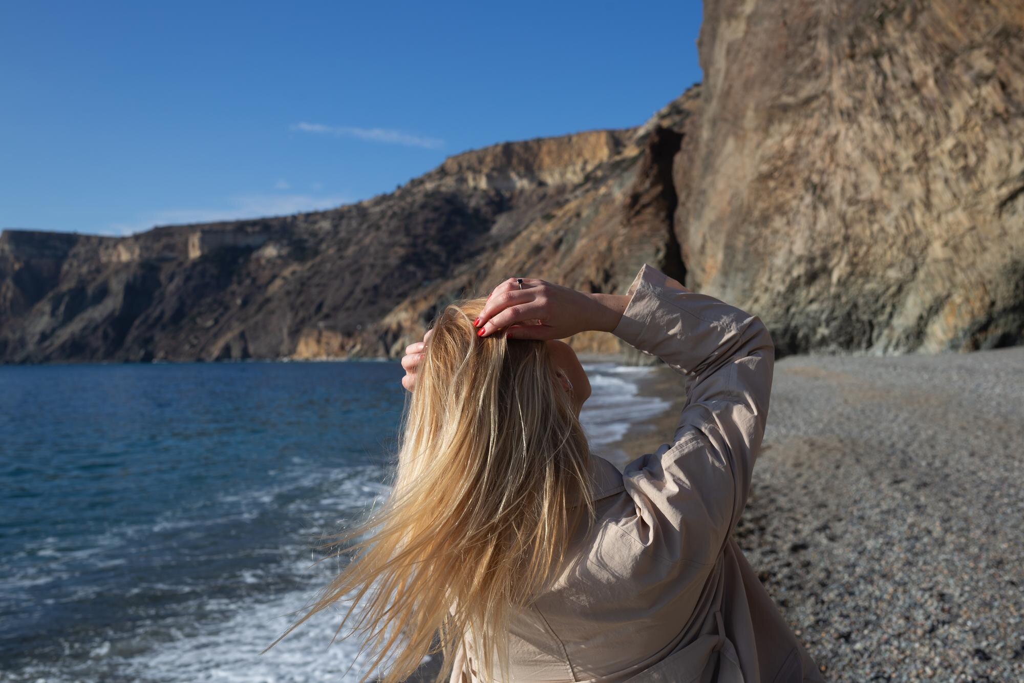 rear view of woman looking at sea against sky adc1be1b195e52616e3a BTOURS