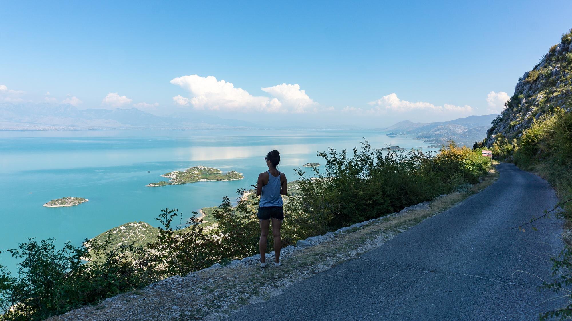 rear view of woman standing on roadside while look 62fe5491c0d4e16e3720 BTOURS