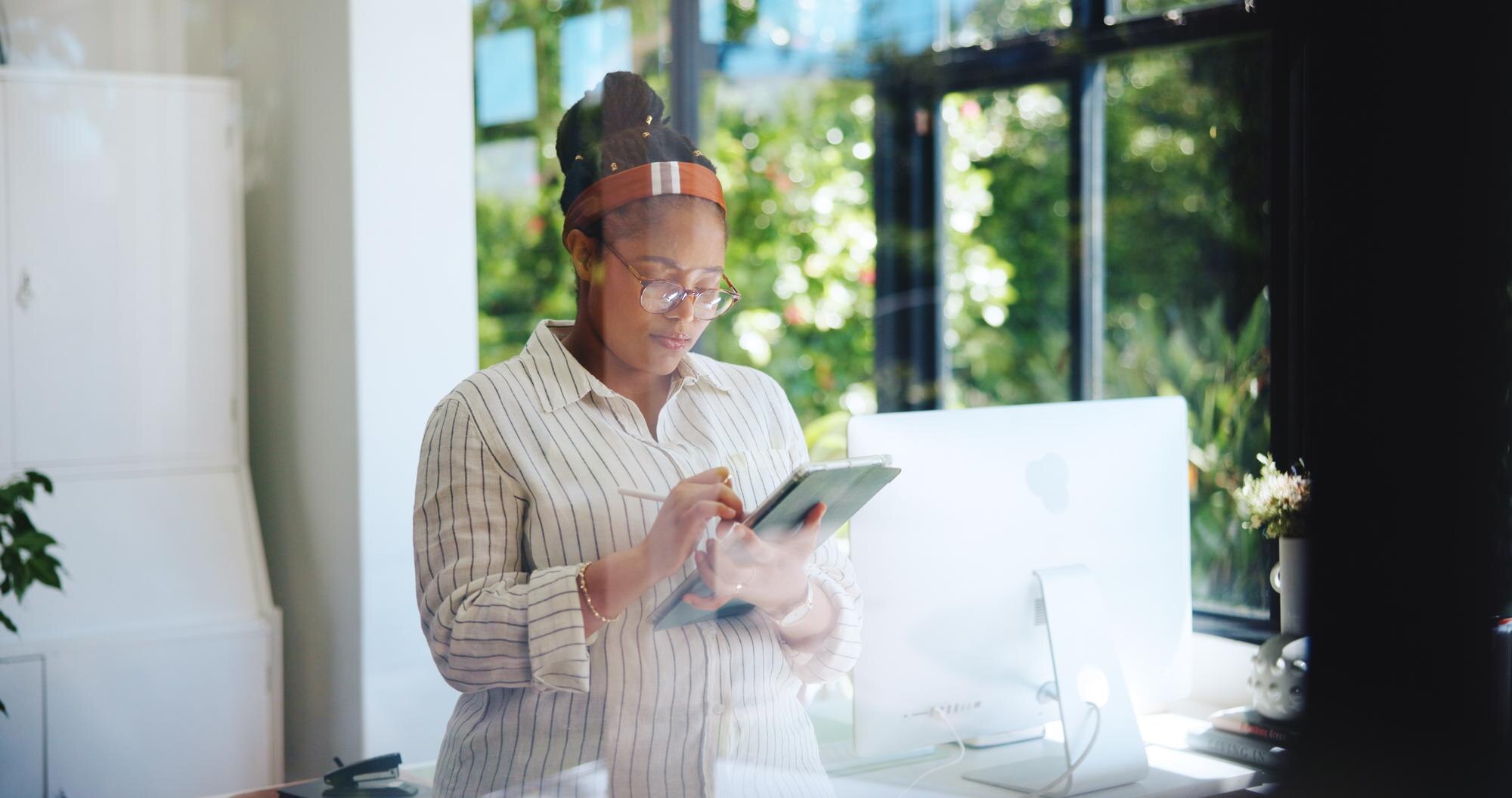 remote work tablet and stylus with black woman in 745bed7ab48002cf888b
