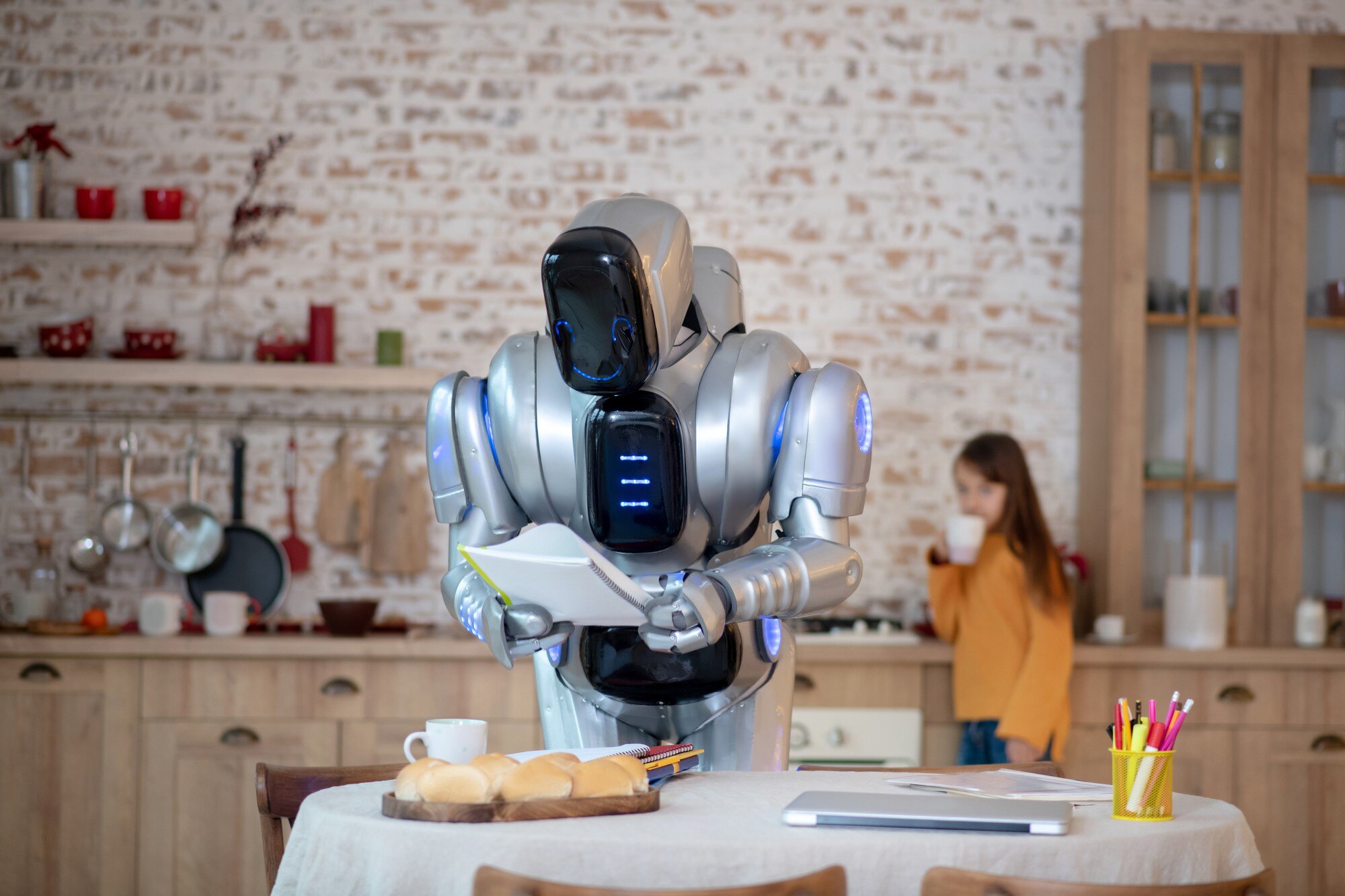 robot with a notebook in hand a3fa14922cf3a6dda91d