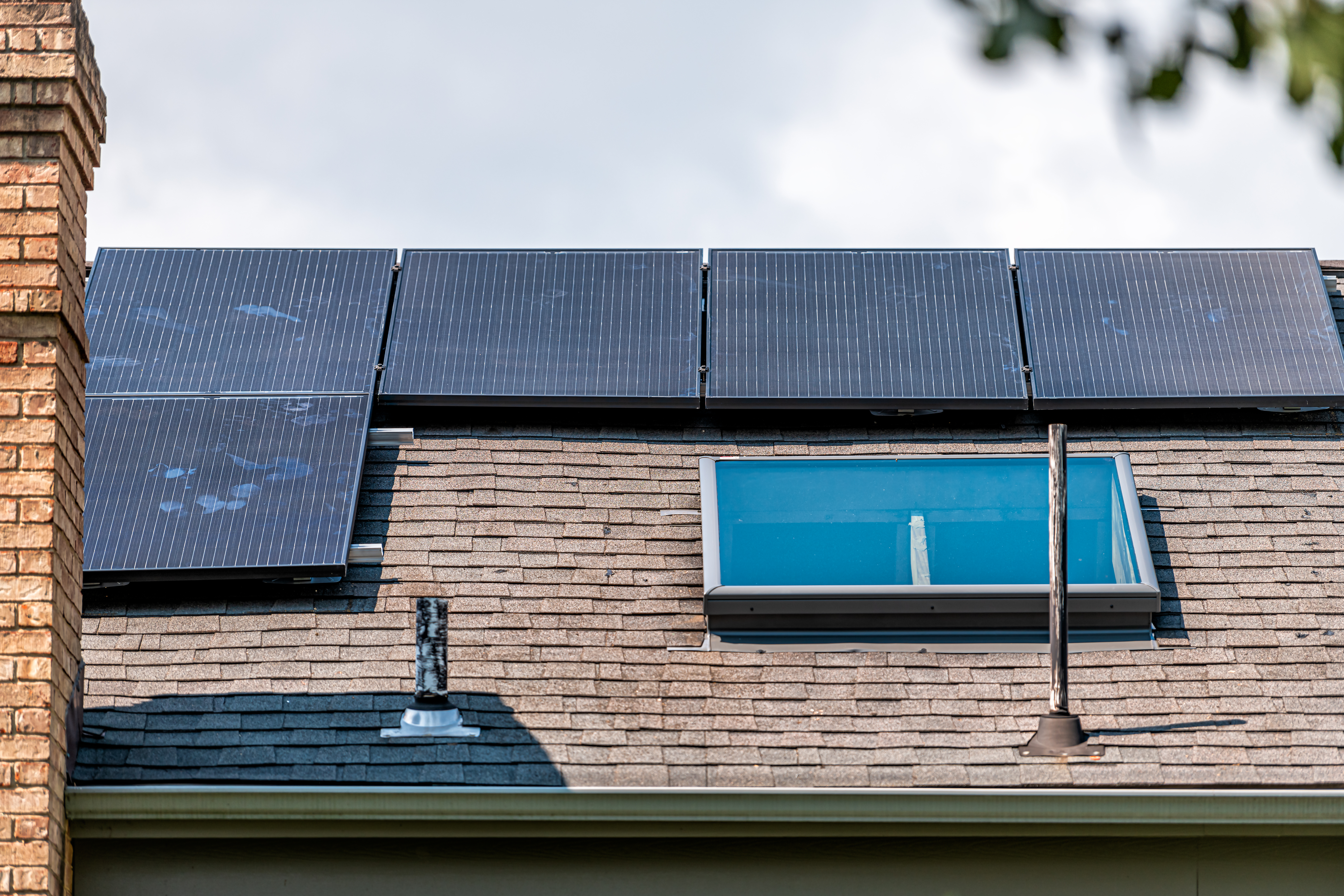 Navigating the Solar Installation Journey with Ease: Your Guide to a Brighter Future 2 rooftop solar panels mounted on racking racks and dc2898a66cbccf5e1c53