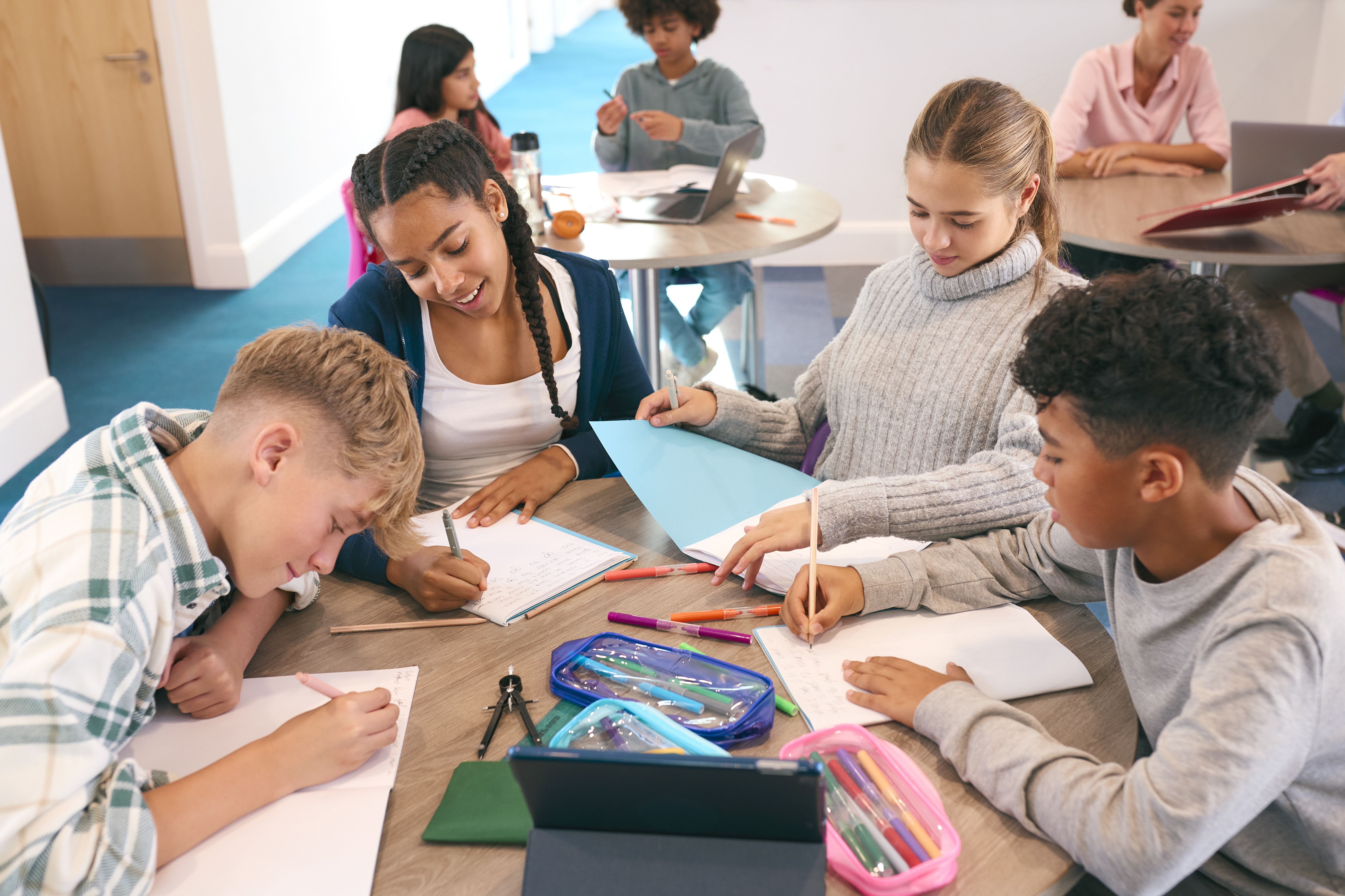 Secondary Or High School Students Collaborating In 4ef5c2b019f560139b32