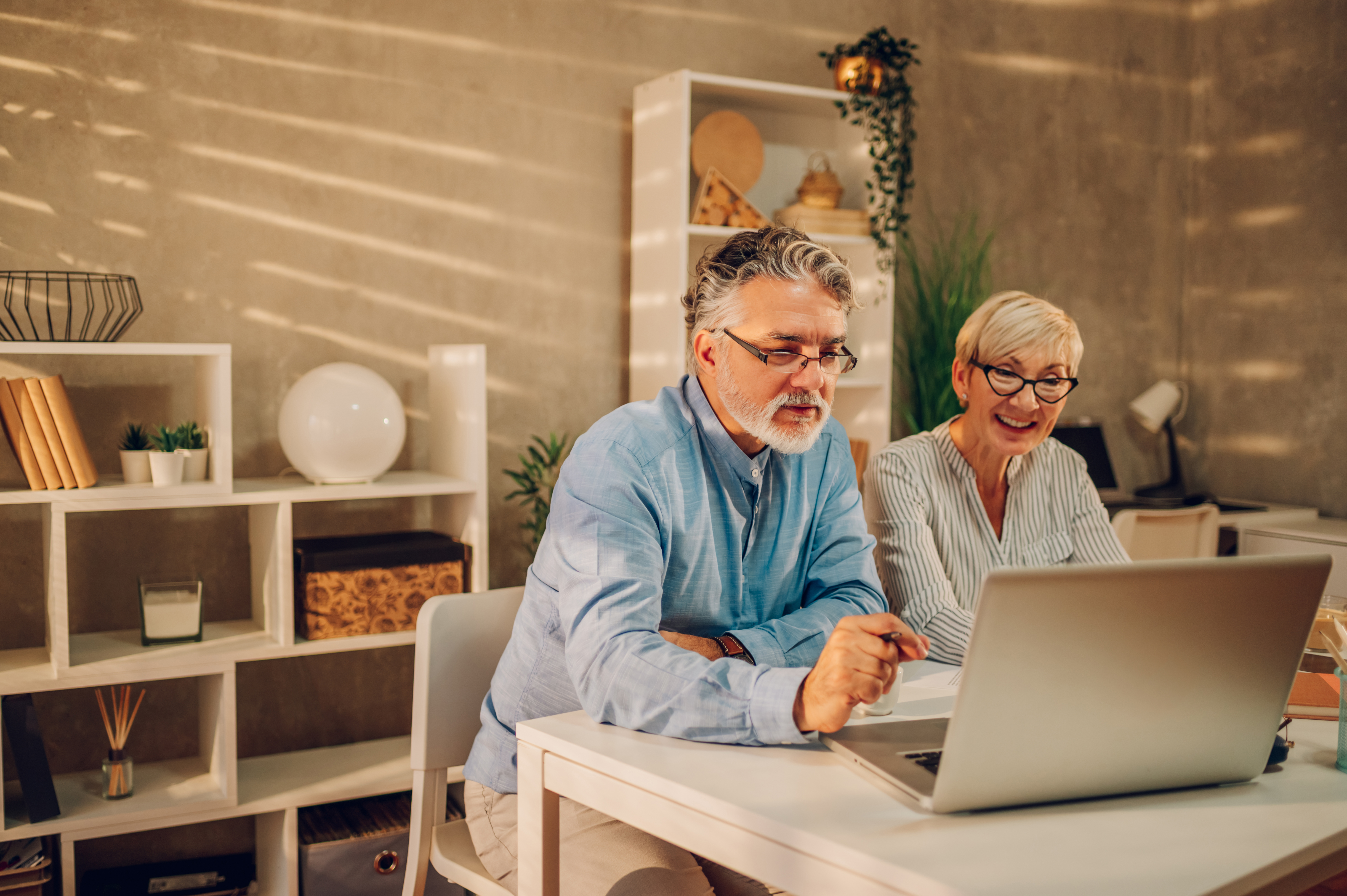 Couple reviewing Hawaii homes online together