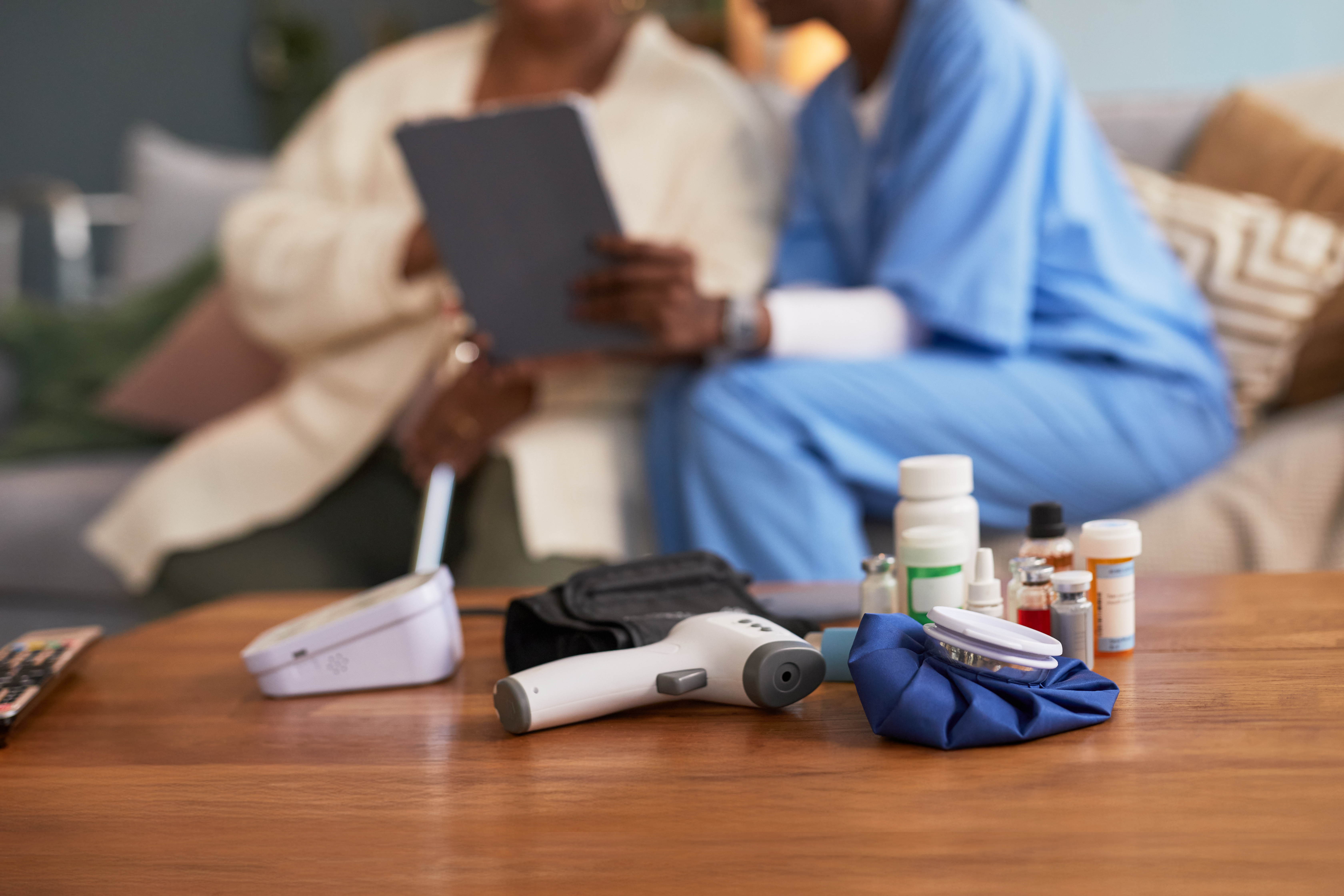senior black woman consulting young black nurse us 675a297e844a86a1592d