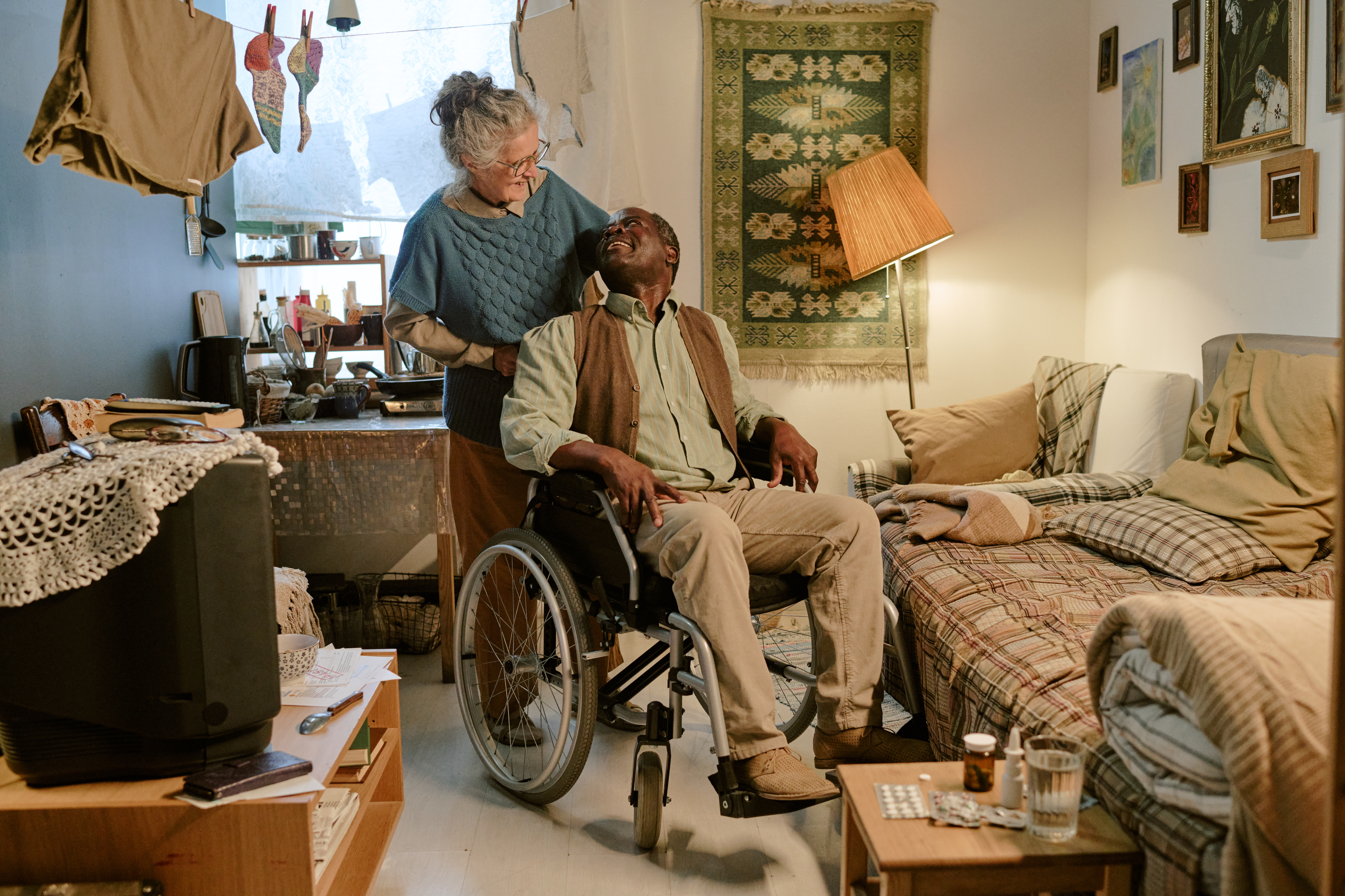 senior caucasian woman assisting senior black man 18c6c5c3aa3c4ff2fd9b