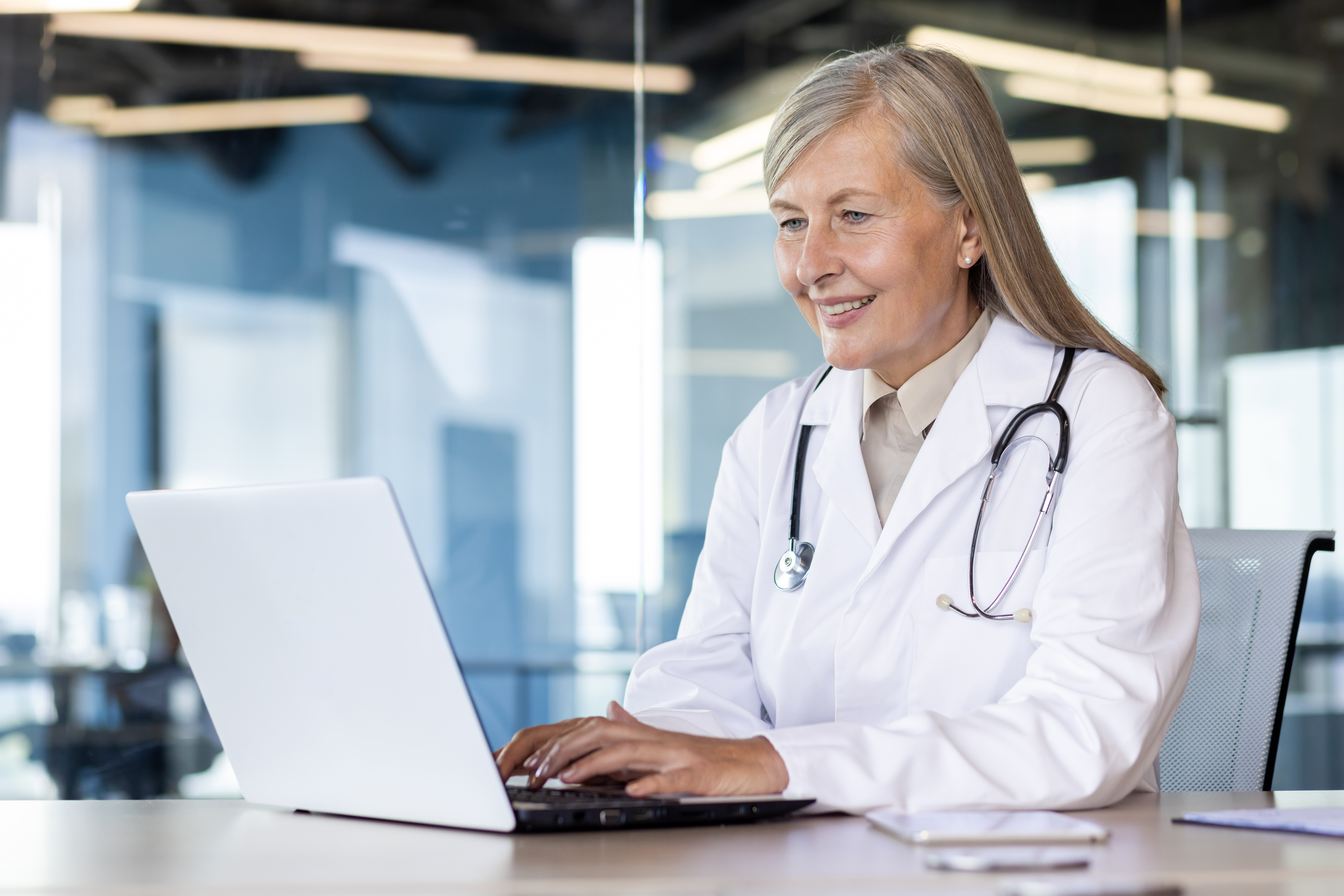 Unlocking Savings: How Telehealth Puts Money Back in Your Pocket 3 senior gray haired female doctor consults and talk 69d33e09d1be3570635b