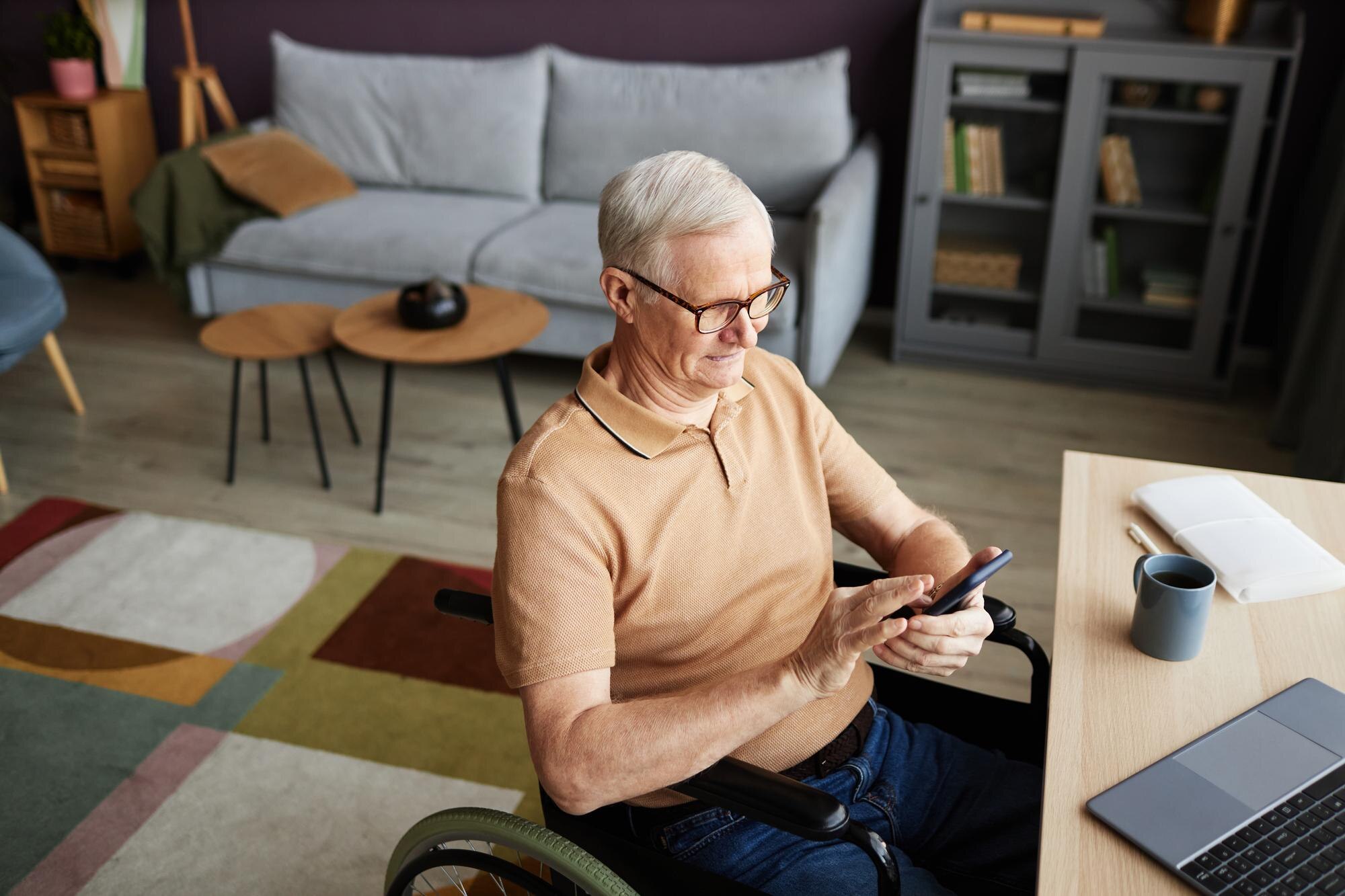 senior man typing message on smartphone 229935550a311cd27e70