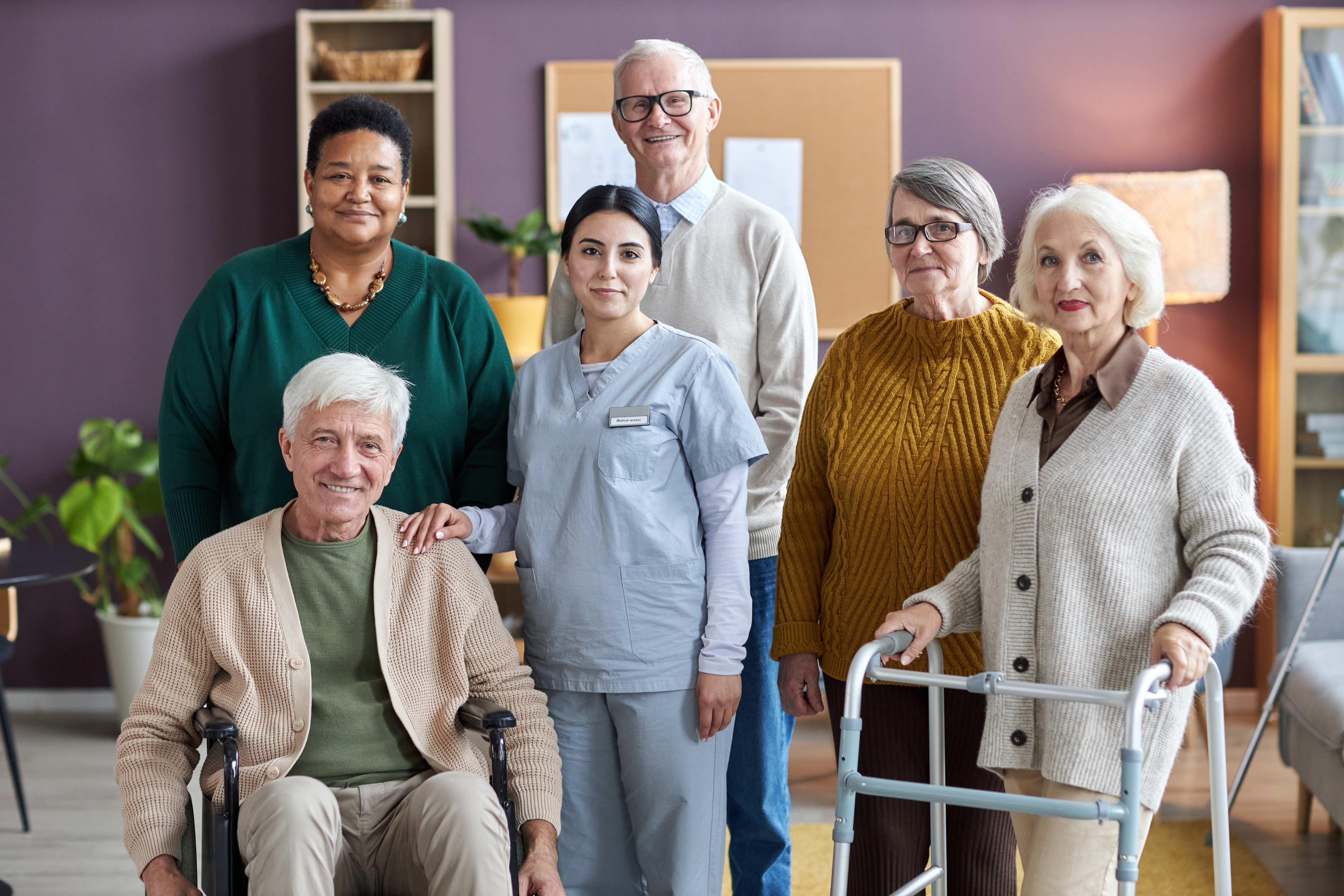 senior people looking at camera in retirement home 9b8cda86b6971dab3f5f