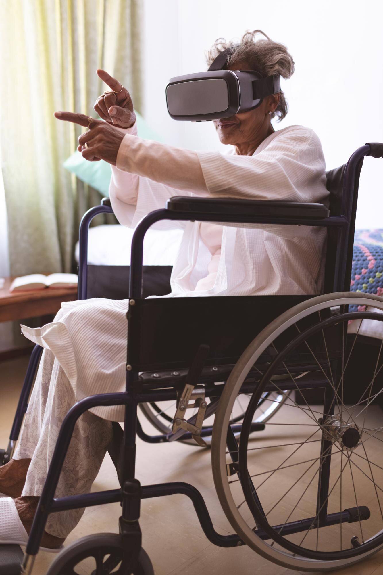 senior woman using virtual realty headset at nursi 03d30014ecfac33263b6