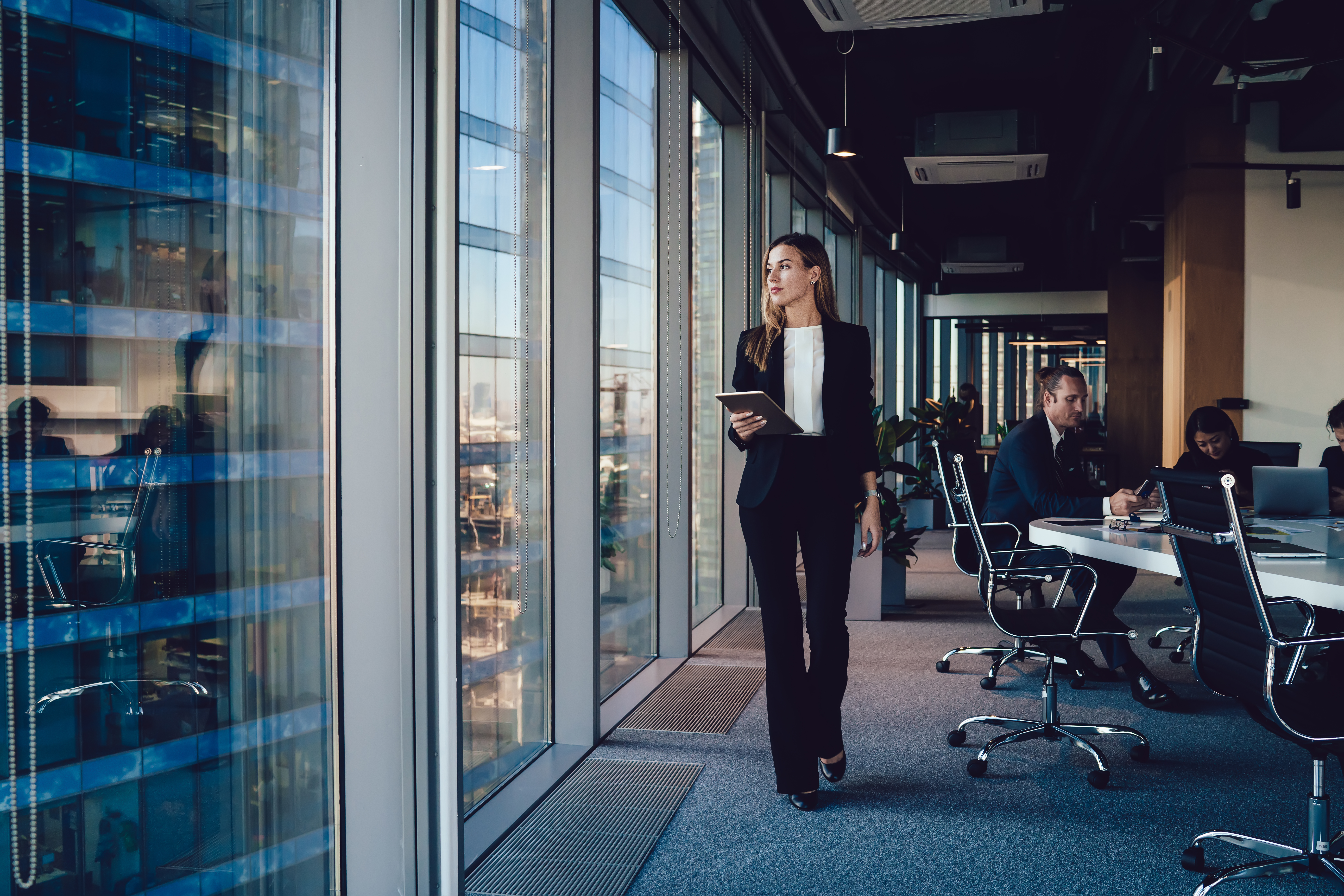 serious female administrative manager in formal su 5c534d501ca564eb70b2