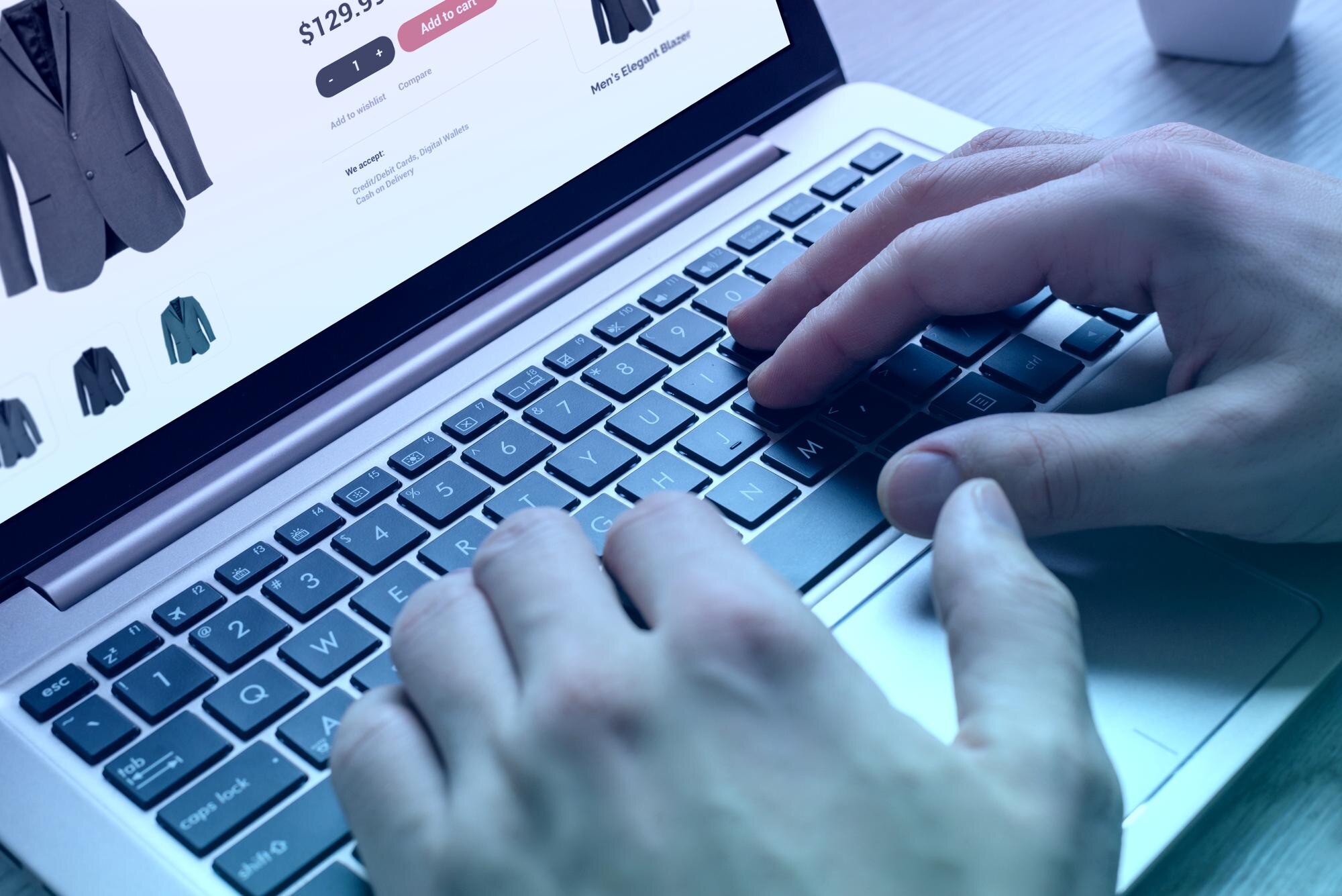 Supercharge Your Shopify or WordPress Site with A/B Testing 13 shopping for clothes online with a laptop ecommerc 50e7e87e908c4797c33e