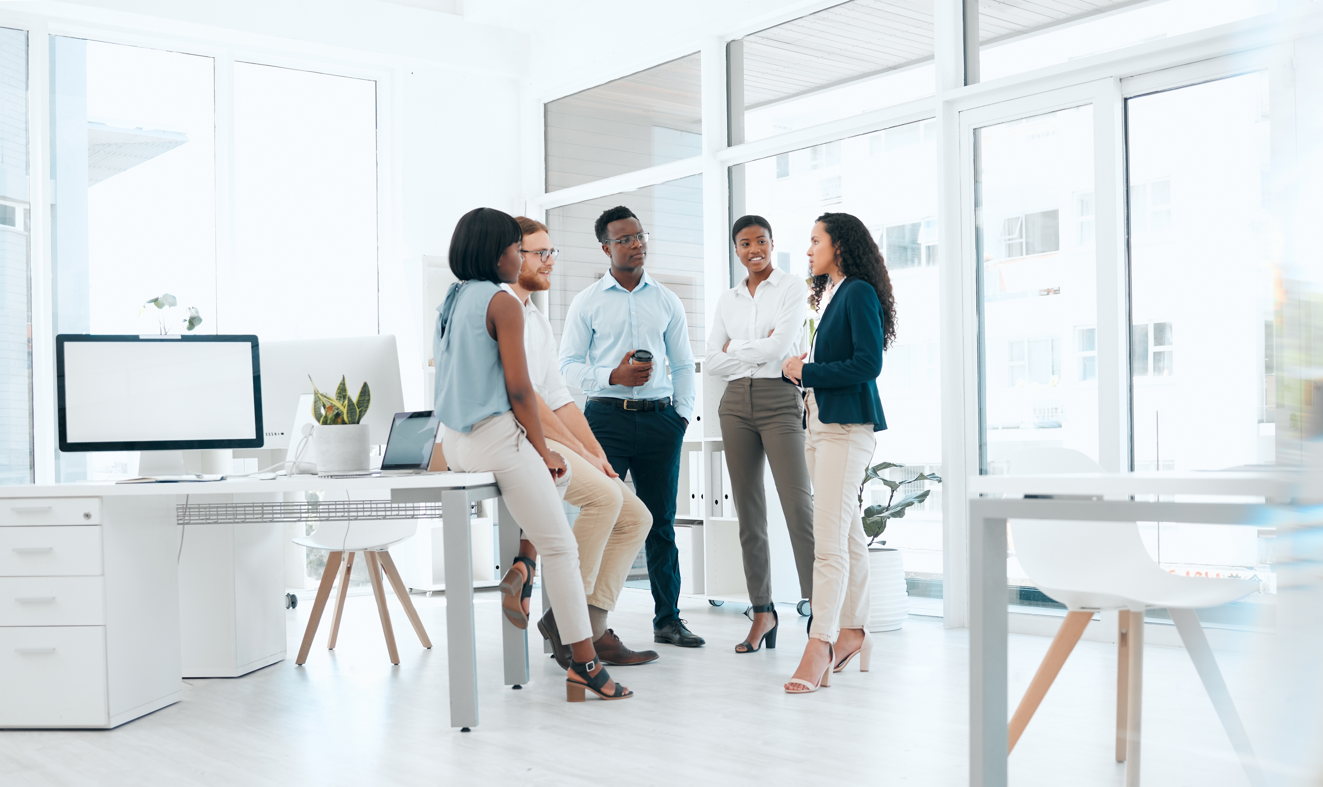shot of a group of businesspeople having a meeting a88985434e19897a6965