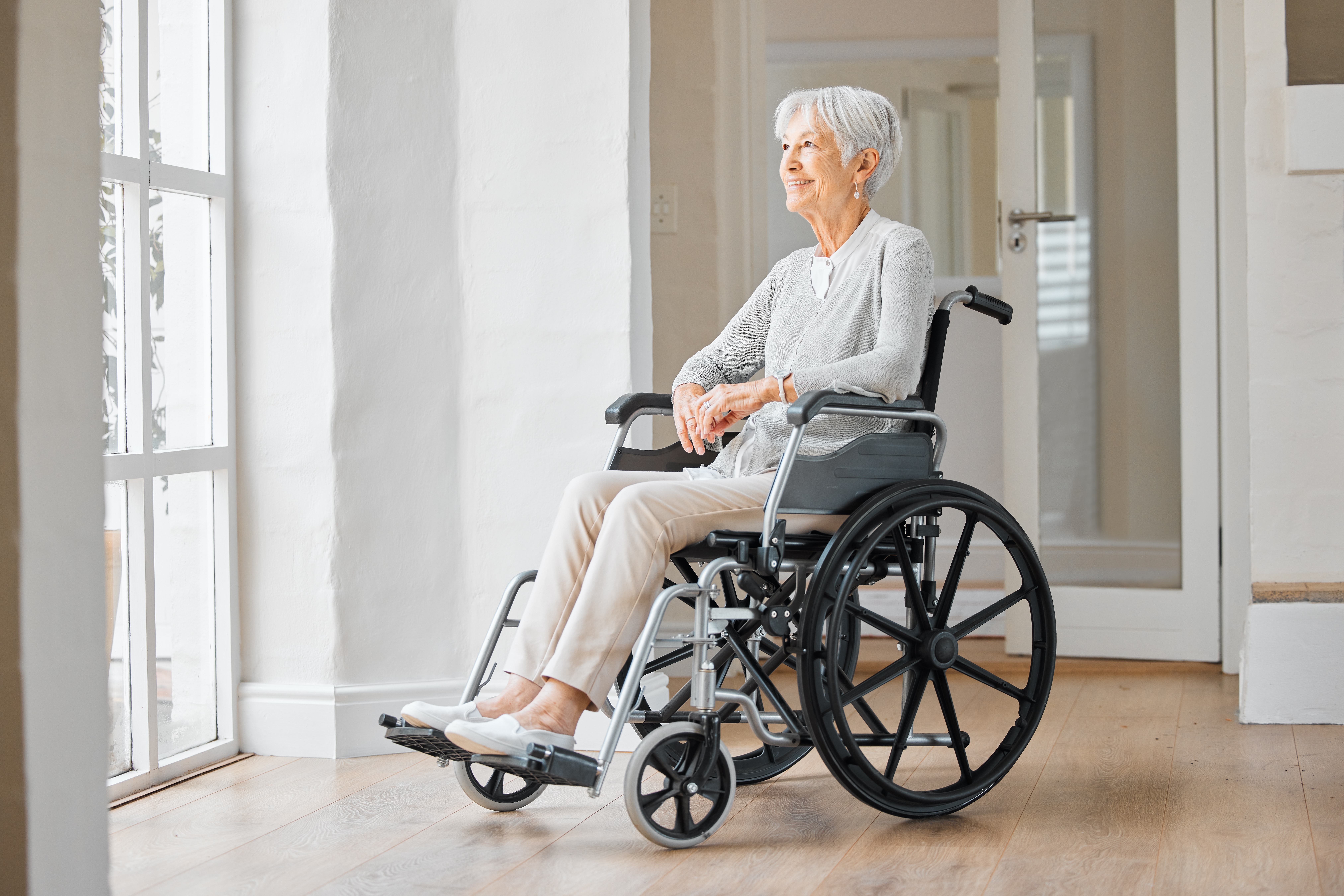 shot of a senior woman sitting in a wheelchair and 57c48f86589dfcef474d