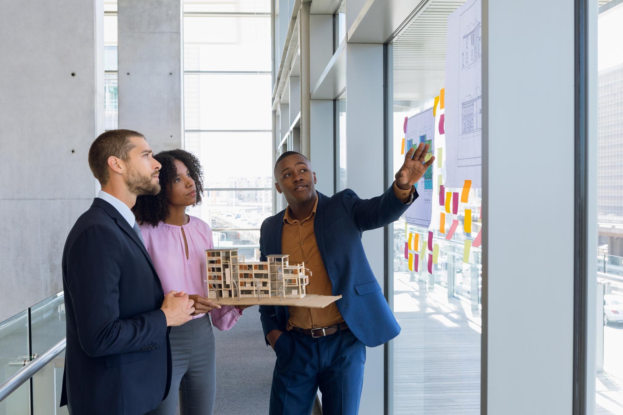 side view of a young african american businesswoma e1eac6b08b0f6fd35f49