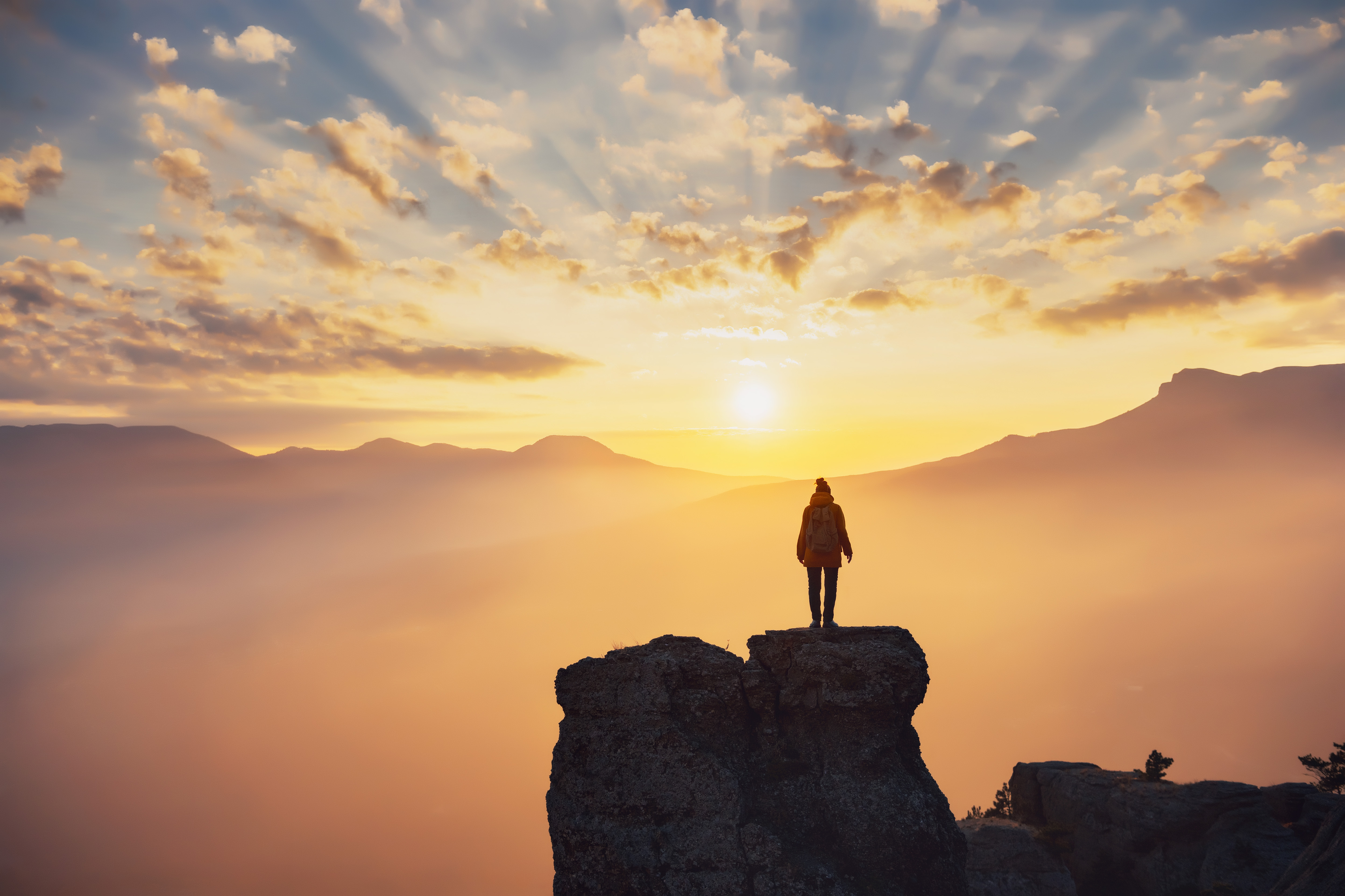 silhouette of hiker girl enjoying sunlight in moun fdcc246073da2622ef7b
