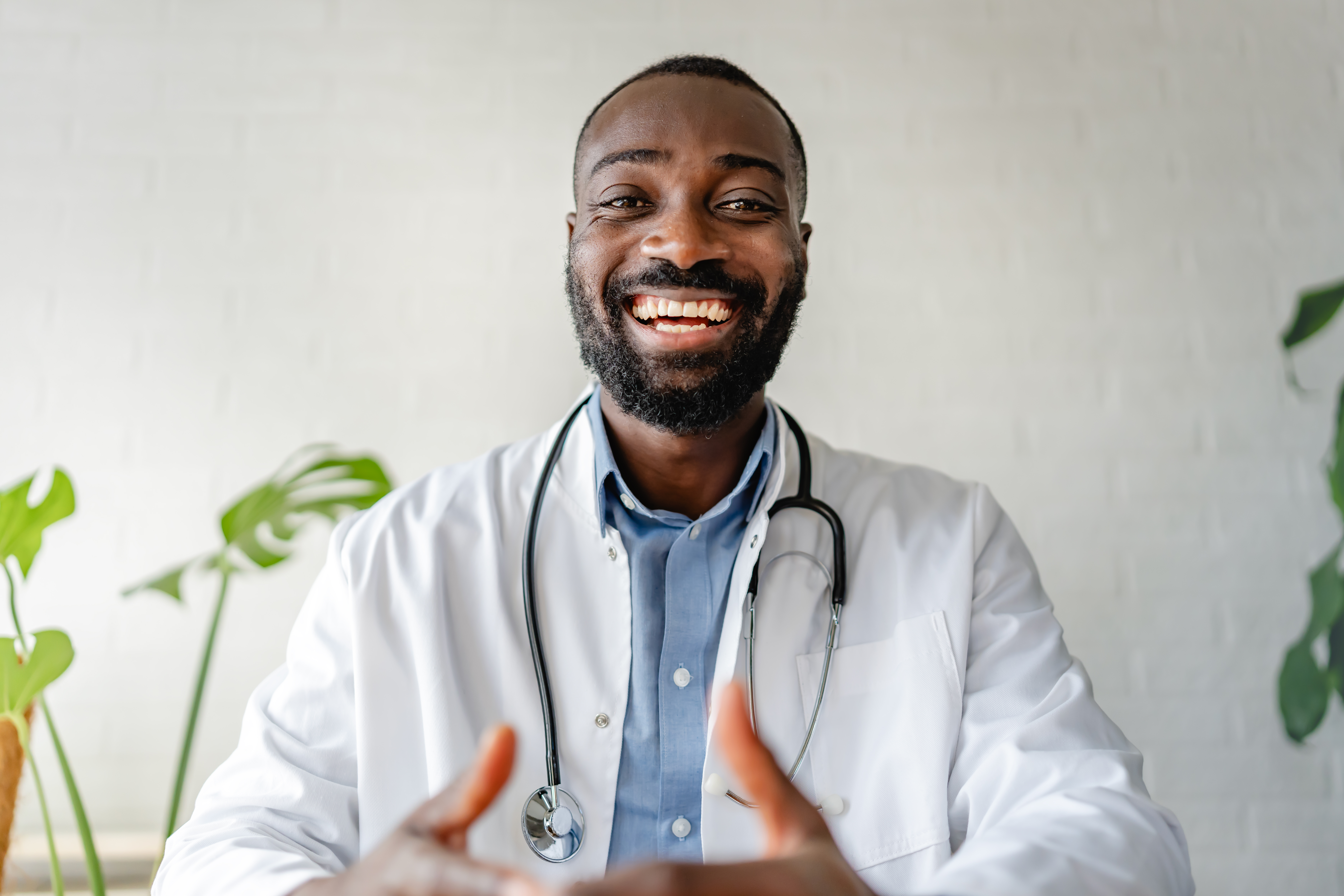 smiling african american doctor having an online c 3fbd0d91891606dfca9d