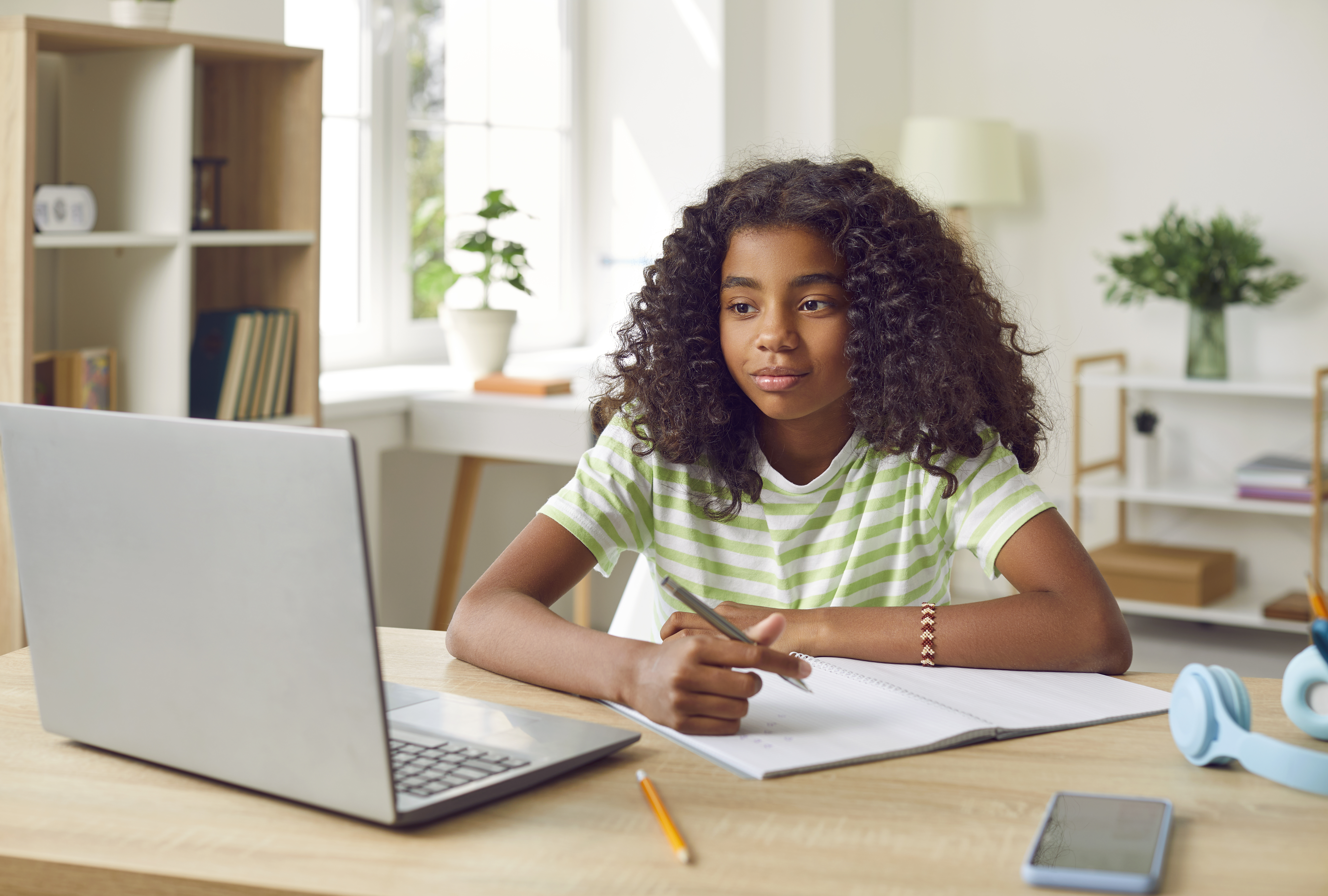 Smiling African American Girl Studying With Laptop 94e1996de60c61eb8fb0