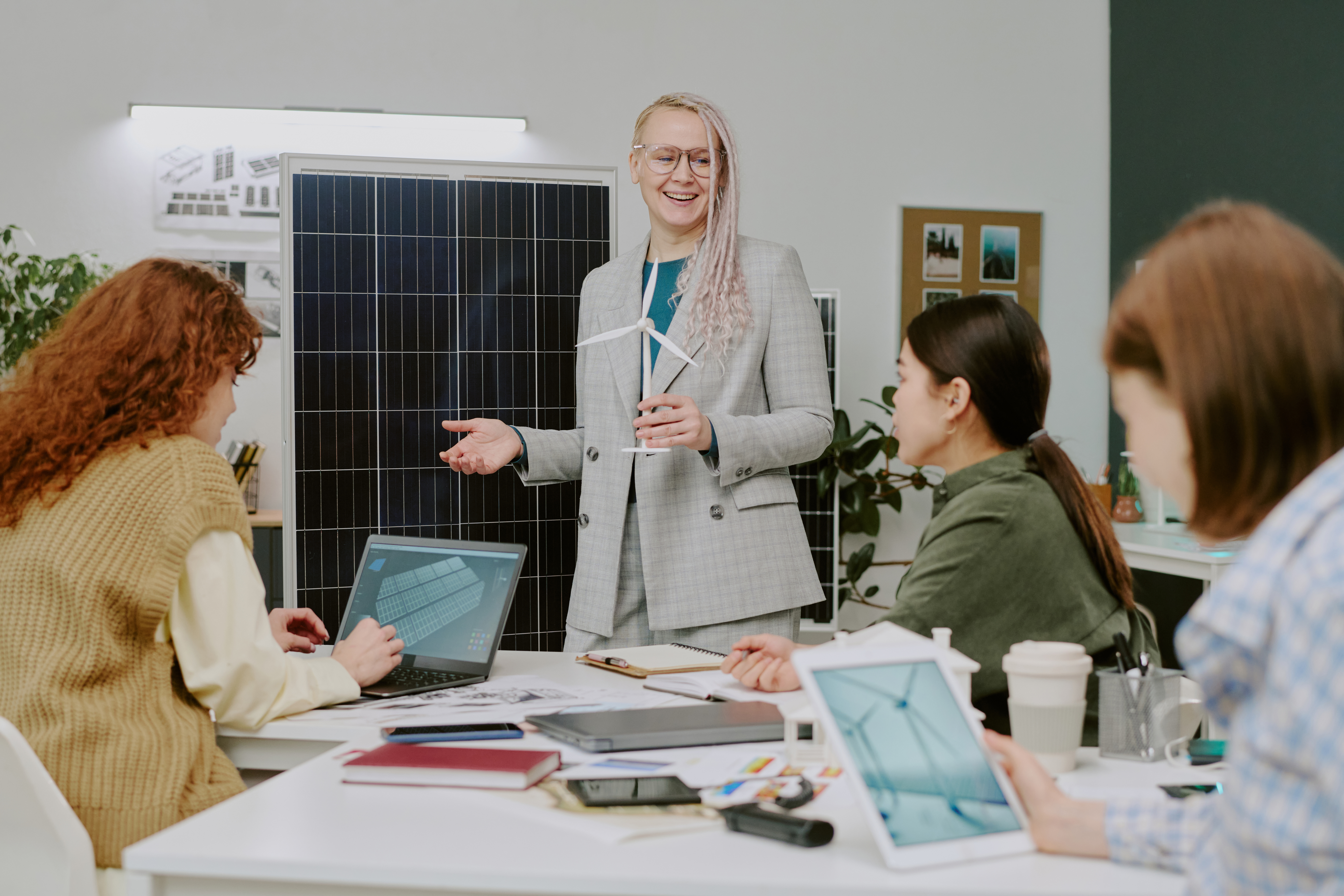 smiling businesswoman giving presentation in moder 8cafb0e38161df7c288f
