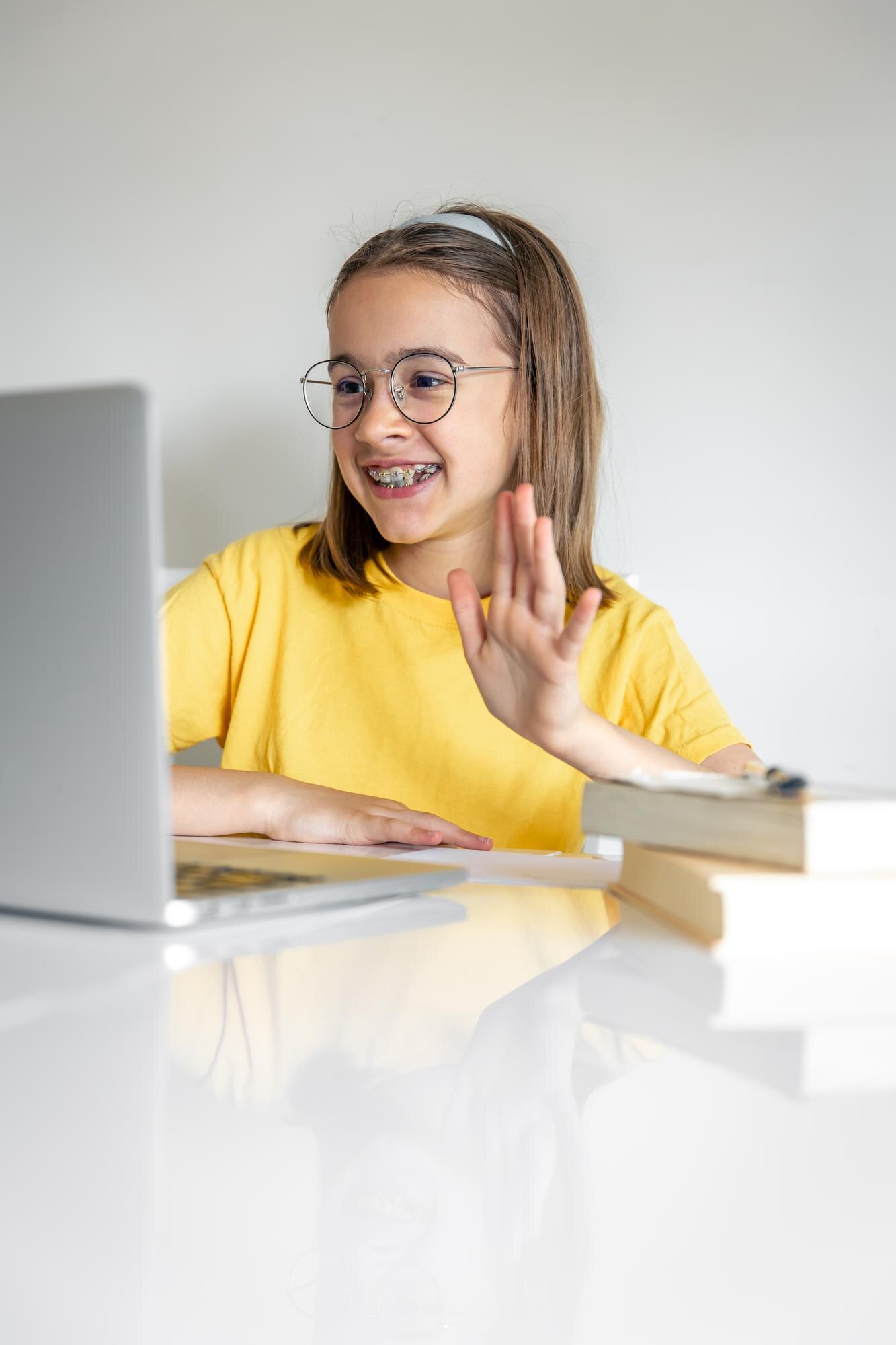 Smiling Caucasian Girl Having Video Call In Remote C68110594412d72716be