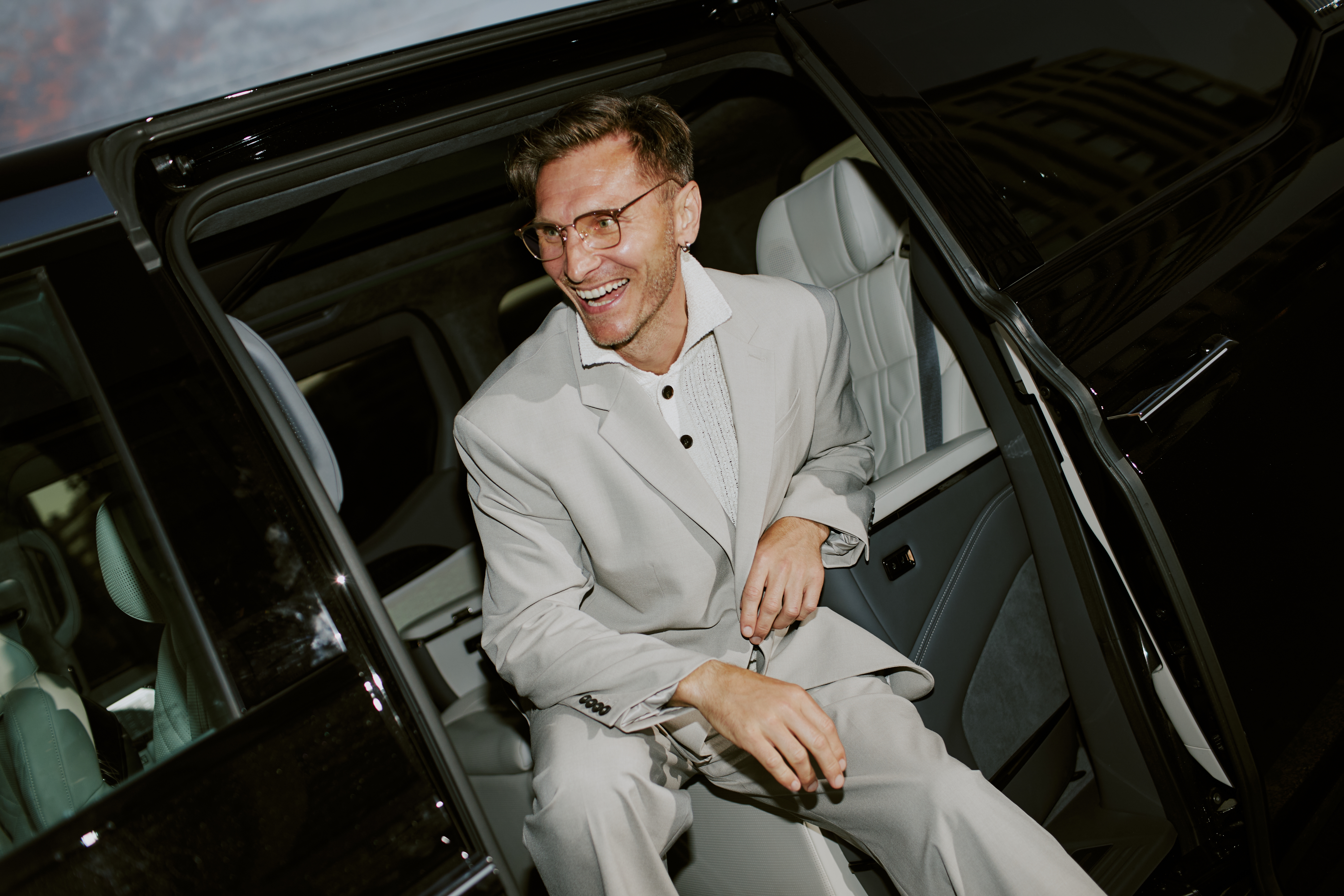 Luxury chauffeur service vehicle arriving for an executive airport transfer, providing premium business travel solutions.
