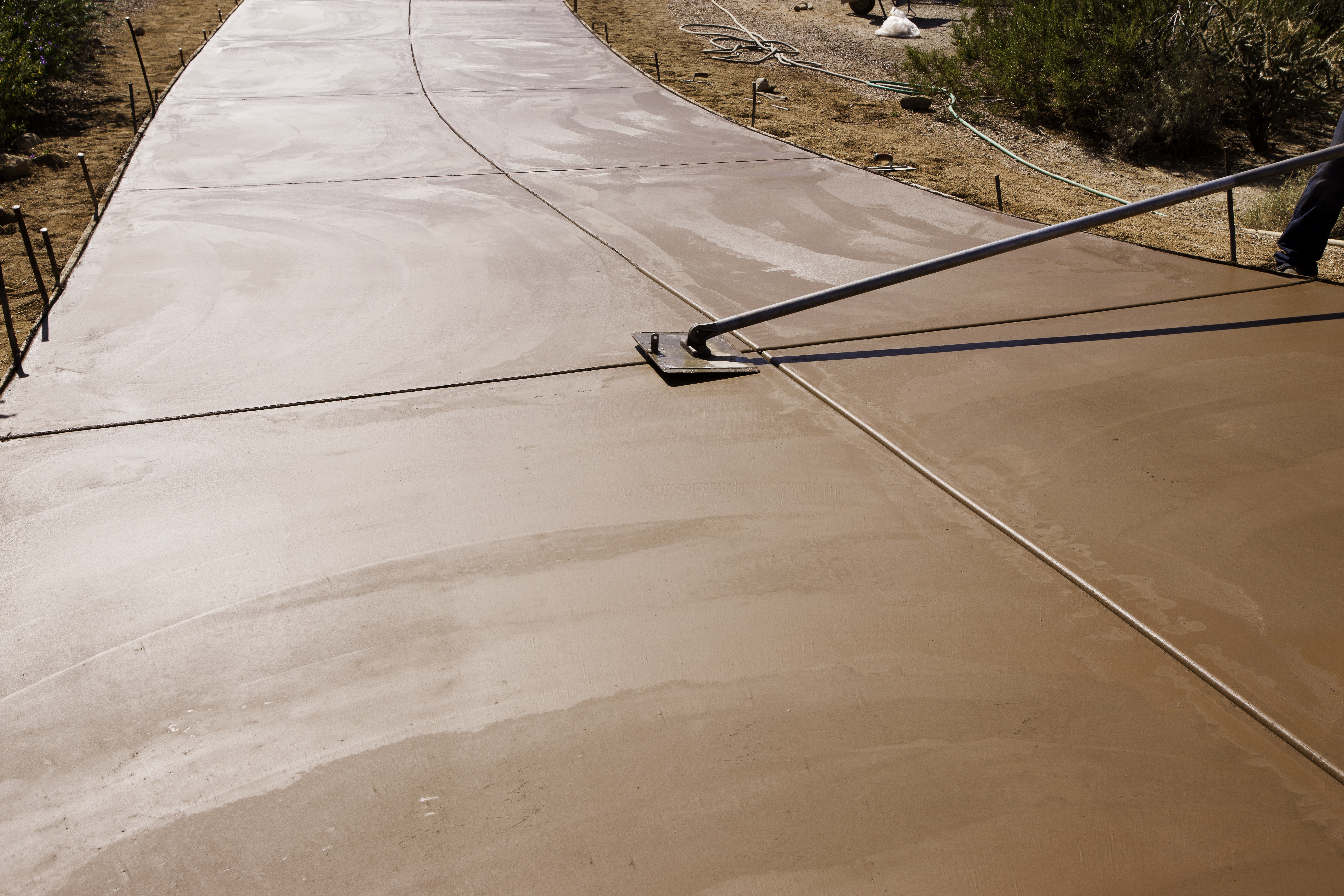 alt="Calcleanseal concrete driveway installation service in San Diego"