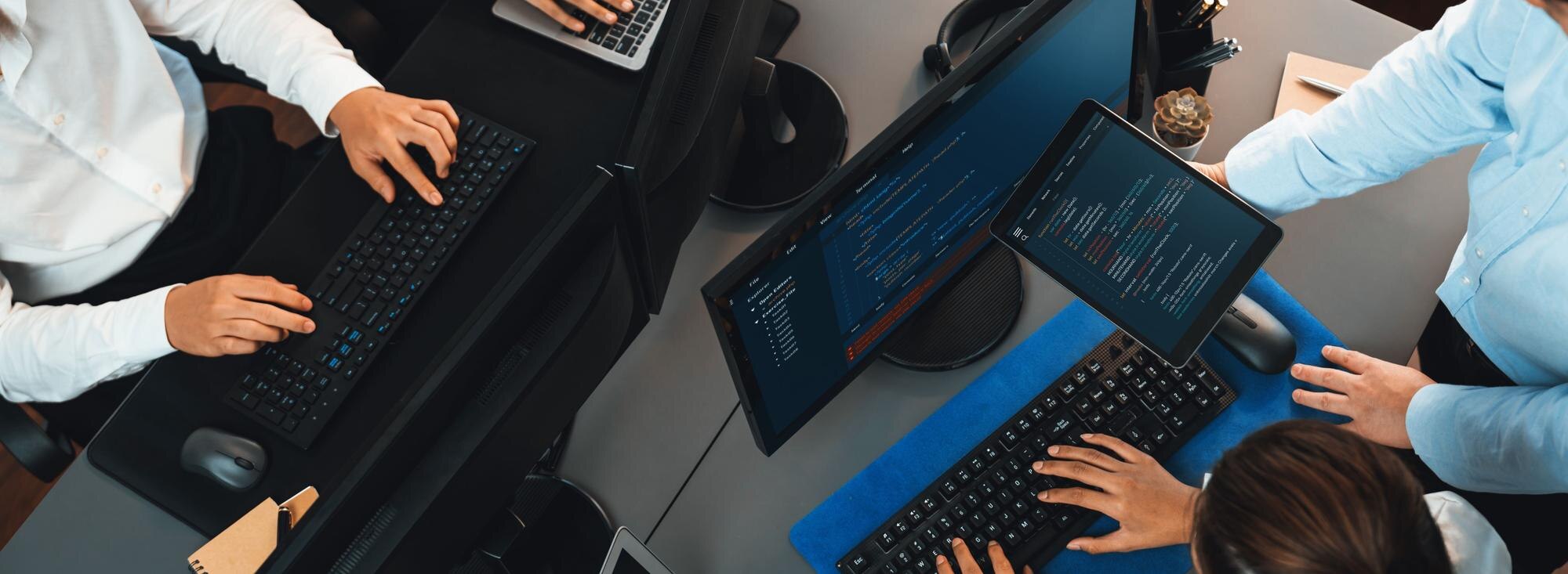 software development team working together in offi bcaf580ab16d809ca612