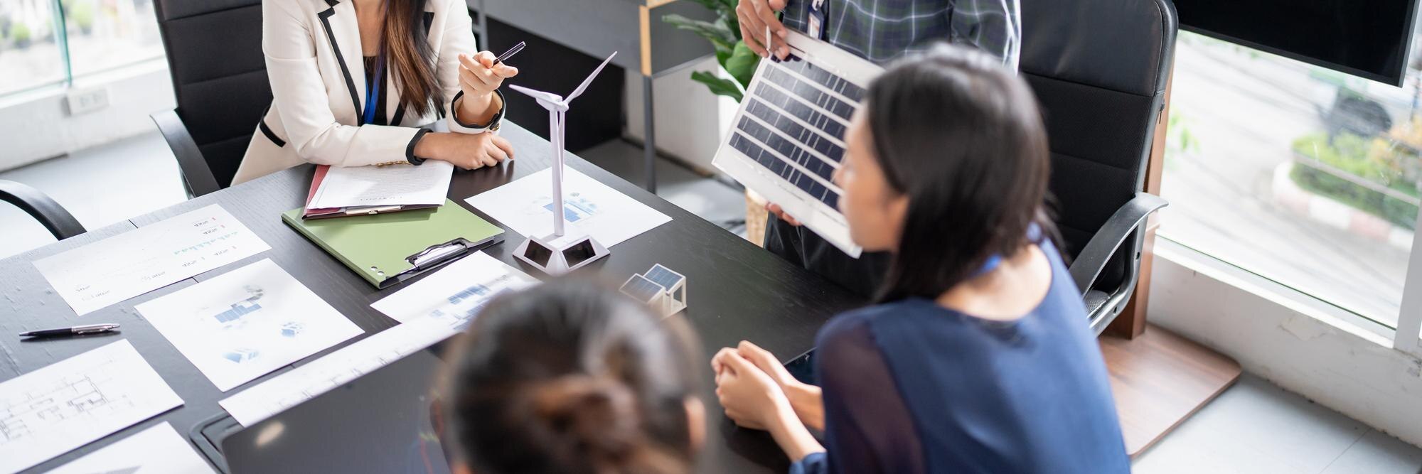 solar panels green energy business people working ef12f5546958c014aad9