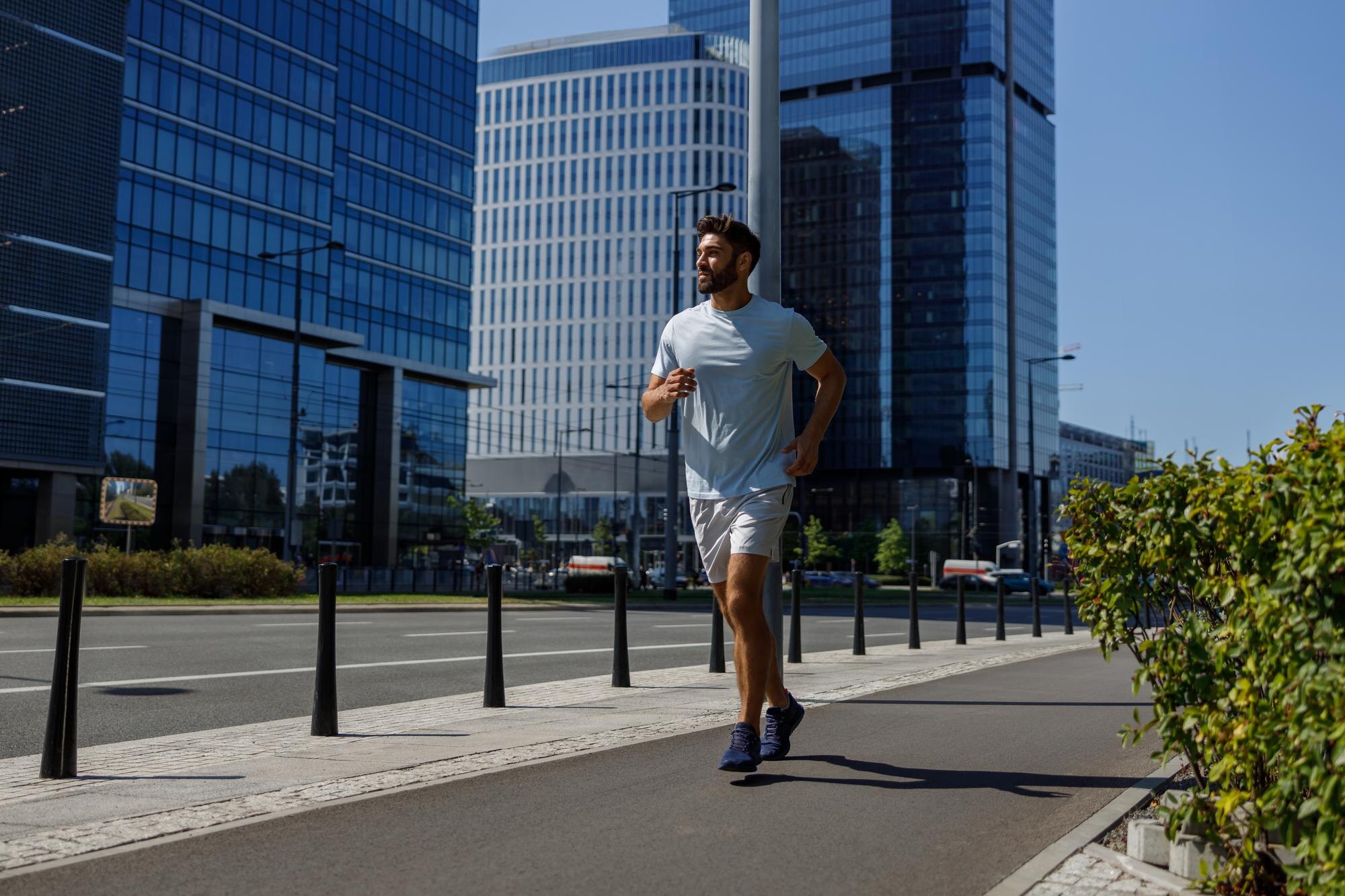 Male runner doing sprint drills in sportswear to stay injury-free