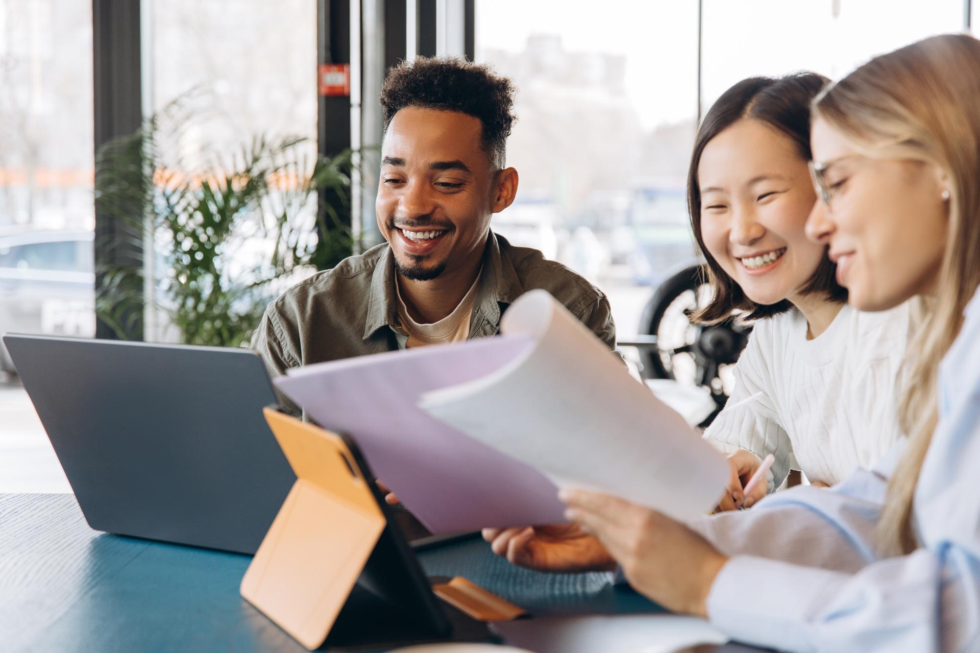 Startup Team Analyzing Documents And Working On Pr 9D06Dd03E6B88E10F5Ce