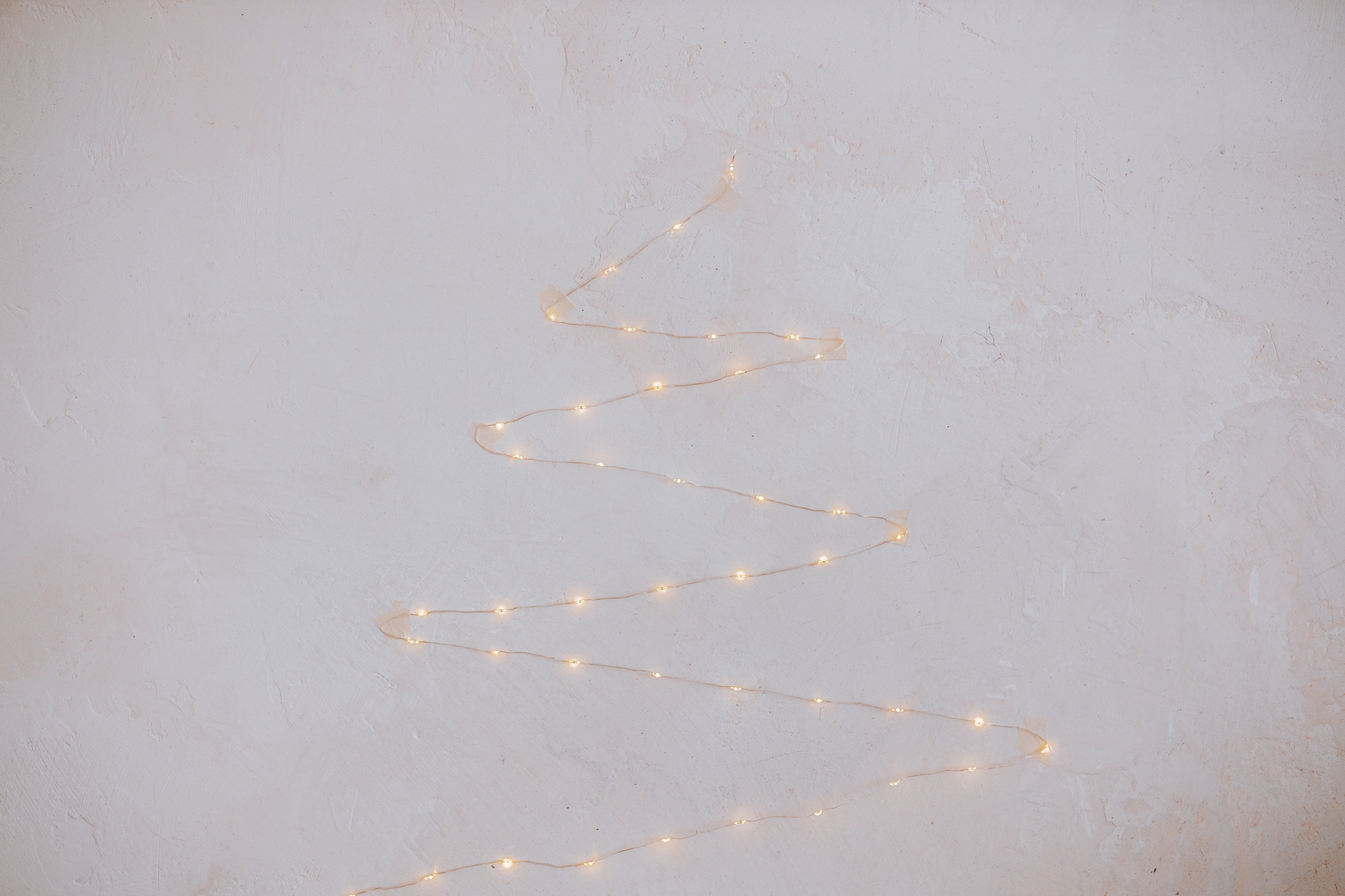 strung fairy lights create a whimsical tree shape f3e3fdbeb2d001ba5b34