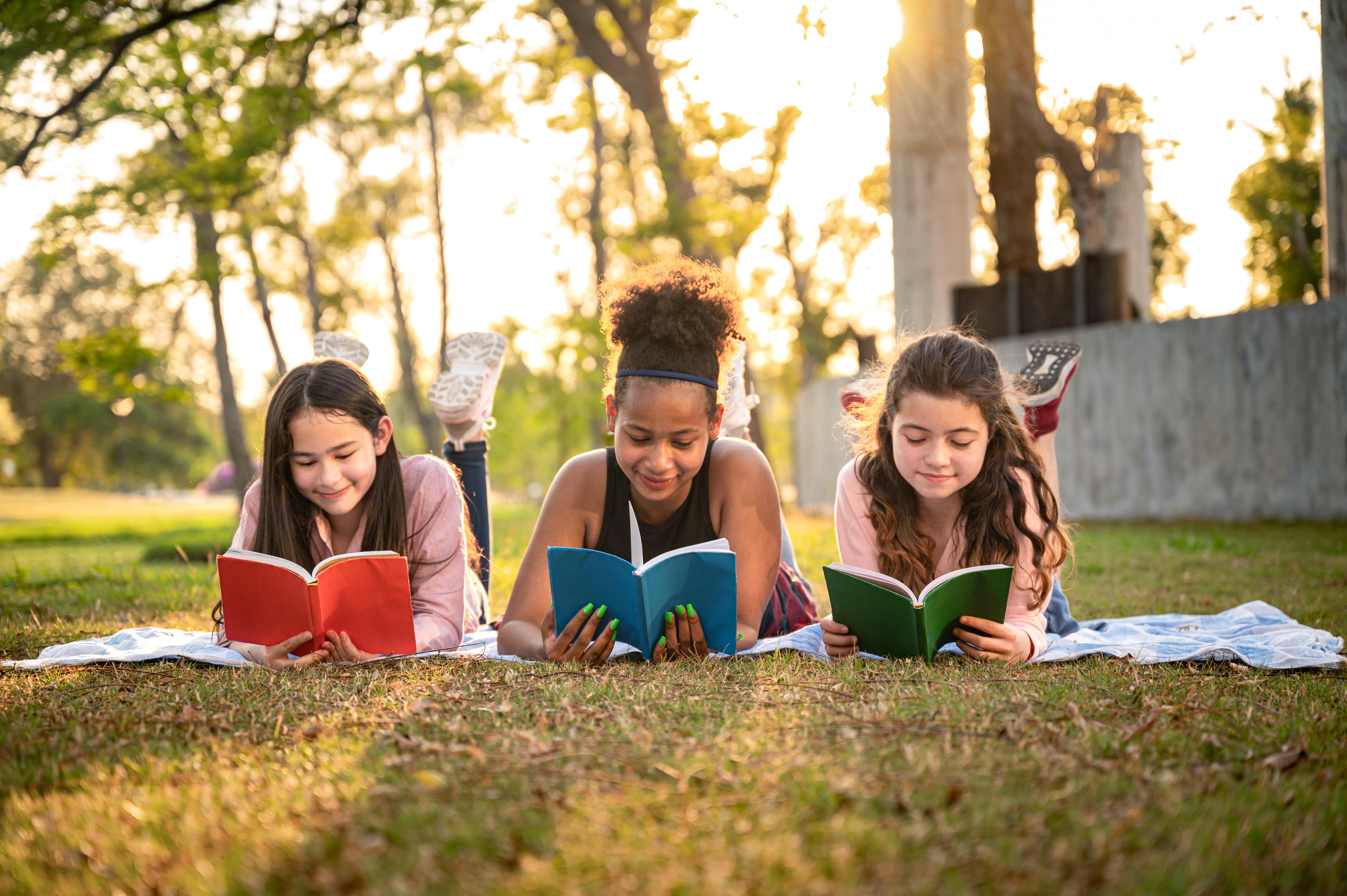Authenticity In Self-Help: The Game-Changer We'Ve All Been Waiting For 3 Student Girl Lie Down Reading Book With Sunset In Ae5A5D932F9B00043E18
