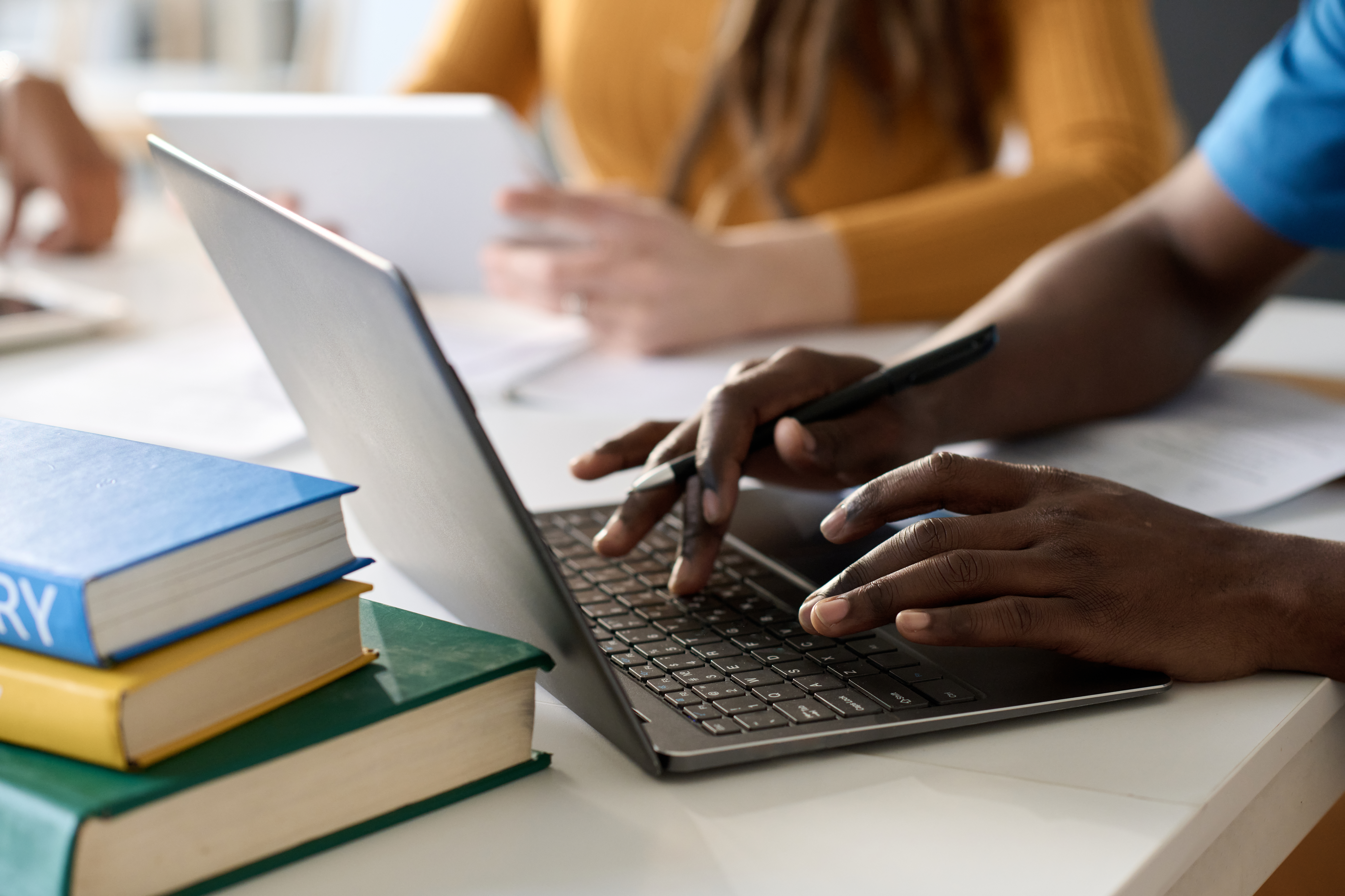 Student Using Laptop In Close Up 3df3cfa9a1b5579ec627