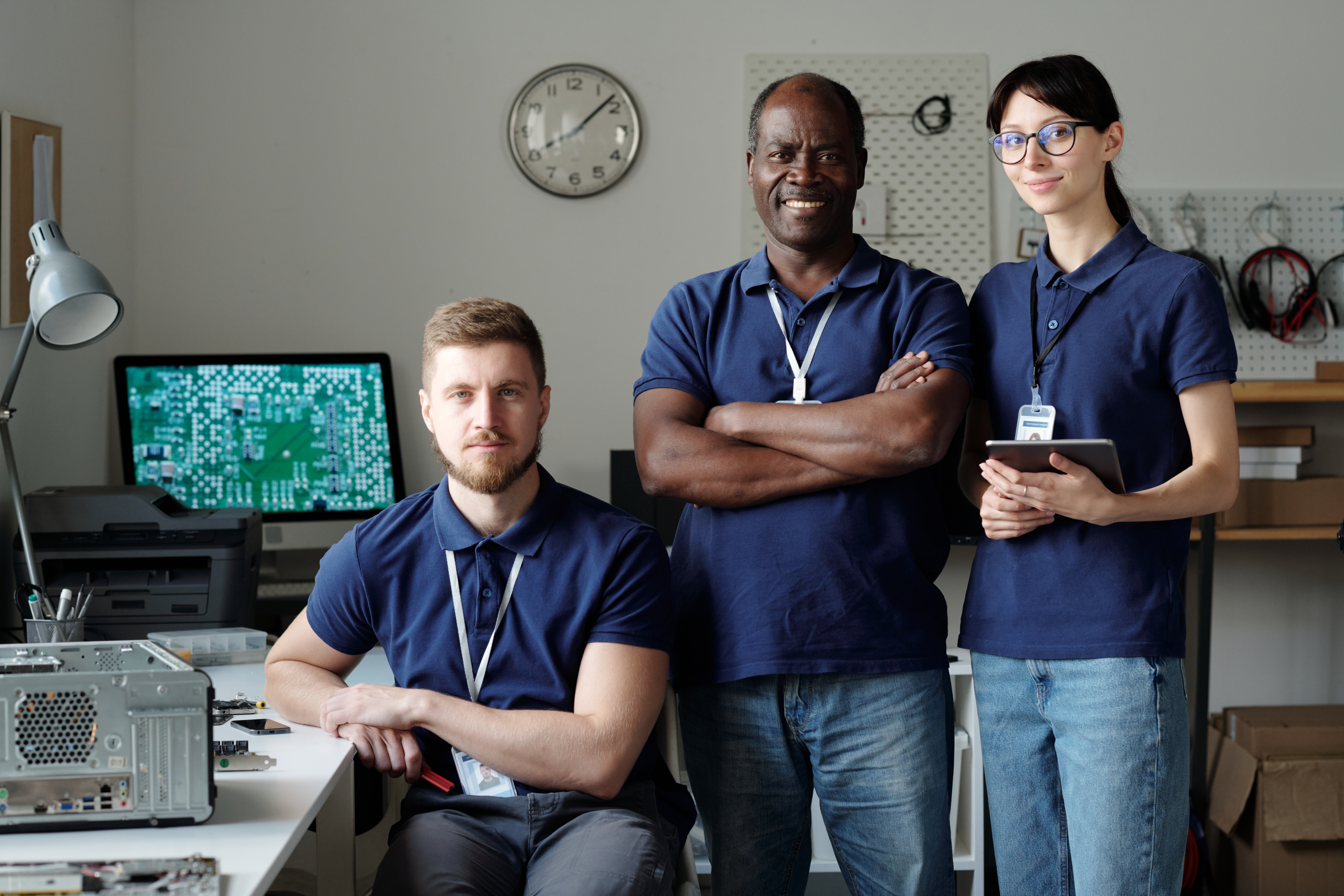 Diverse technicians working in industrial setting