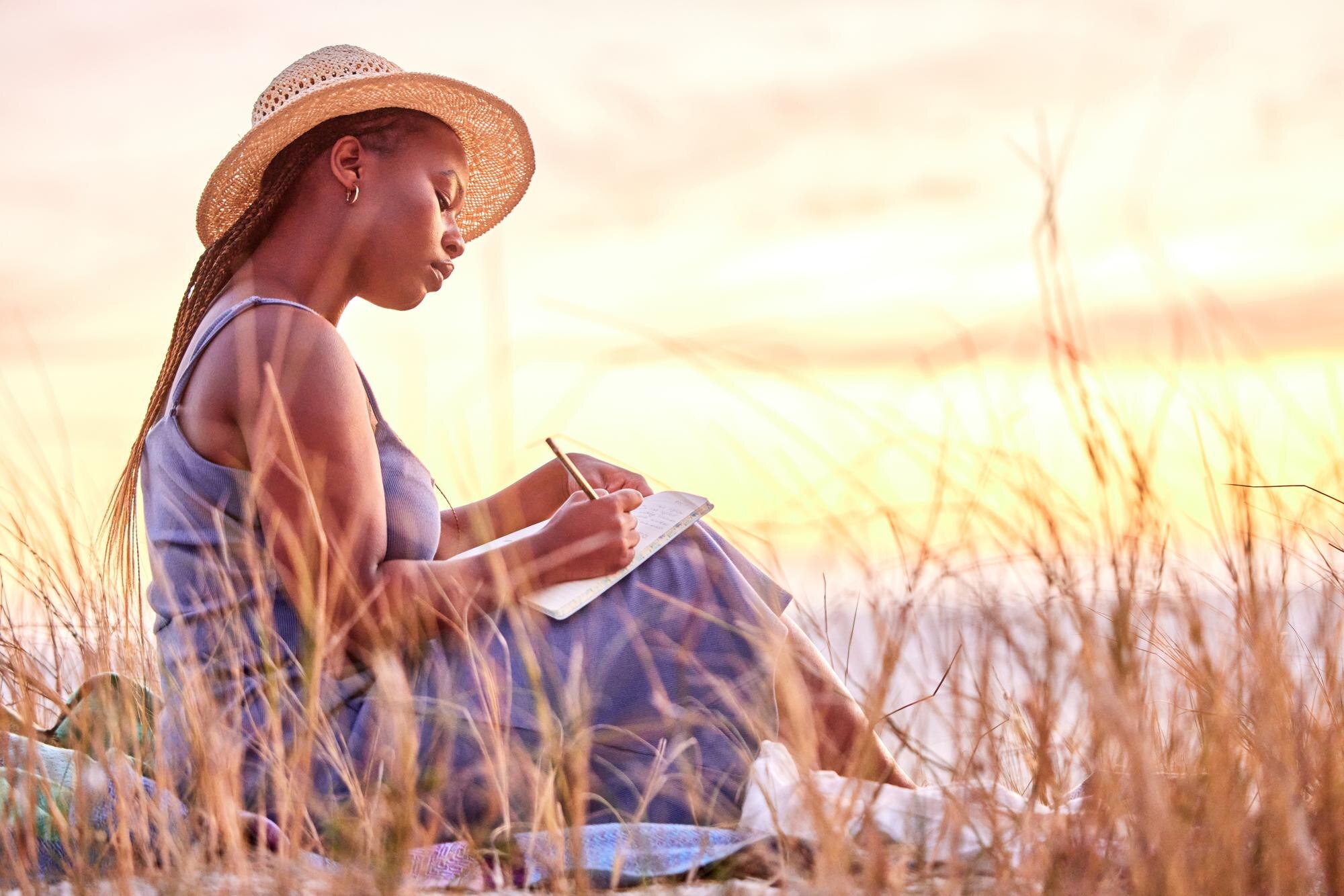 sunset diary and black woman journaling in nature 2770bf79d3d71bb81c2a