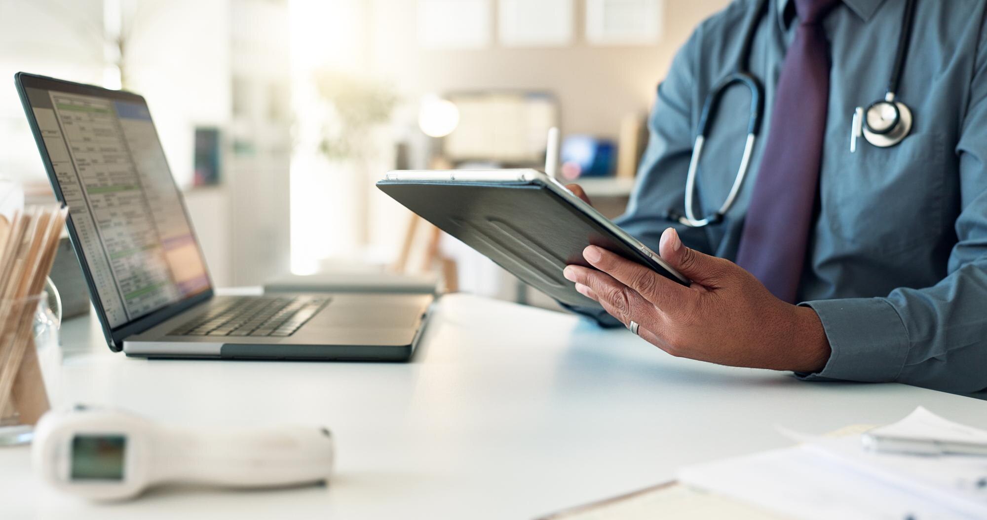 tablet doctor or hands in hospital for research wr 0d503630c3e379fdb74f - MedWell Digital Marketing Agency