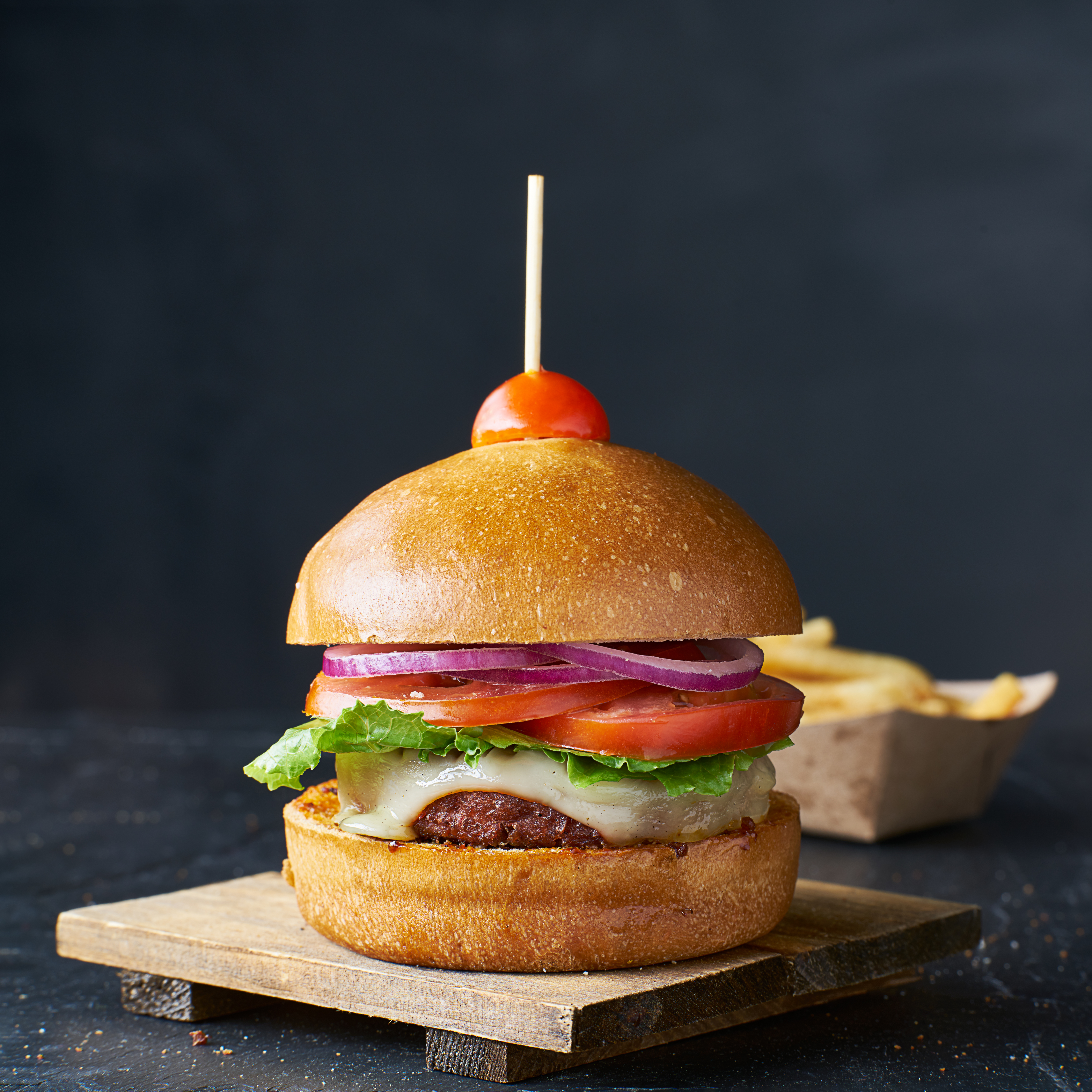 tasty vegan cheeseburger with meat alternative pat 66e7b75411a4cba0b330