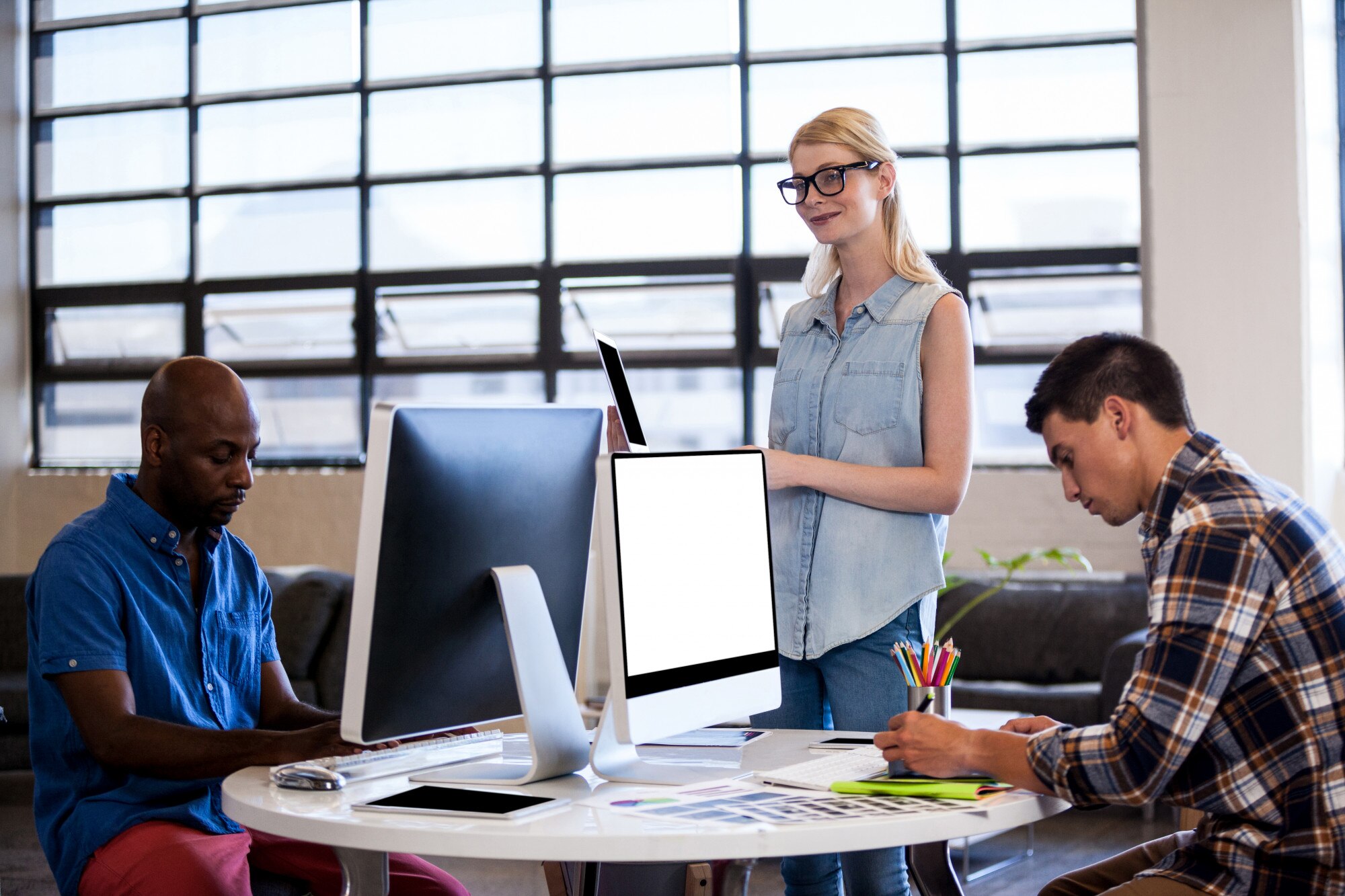 team of business people working together in office ef2d7c7042be501bb72a