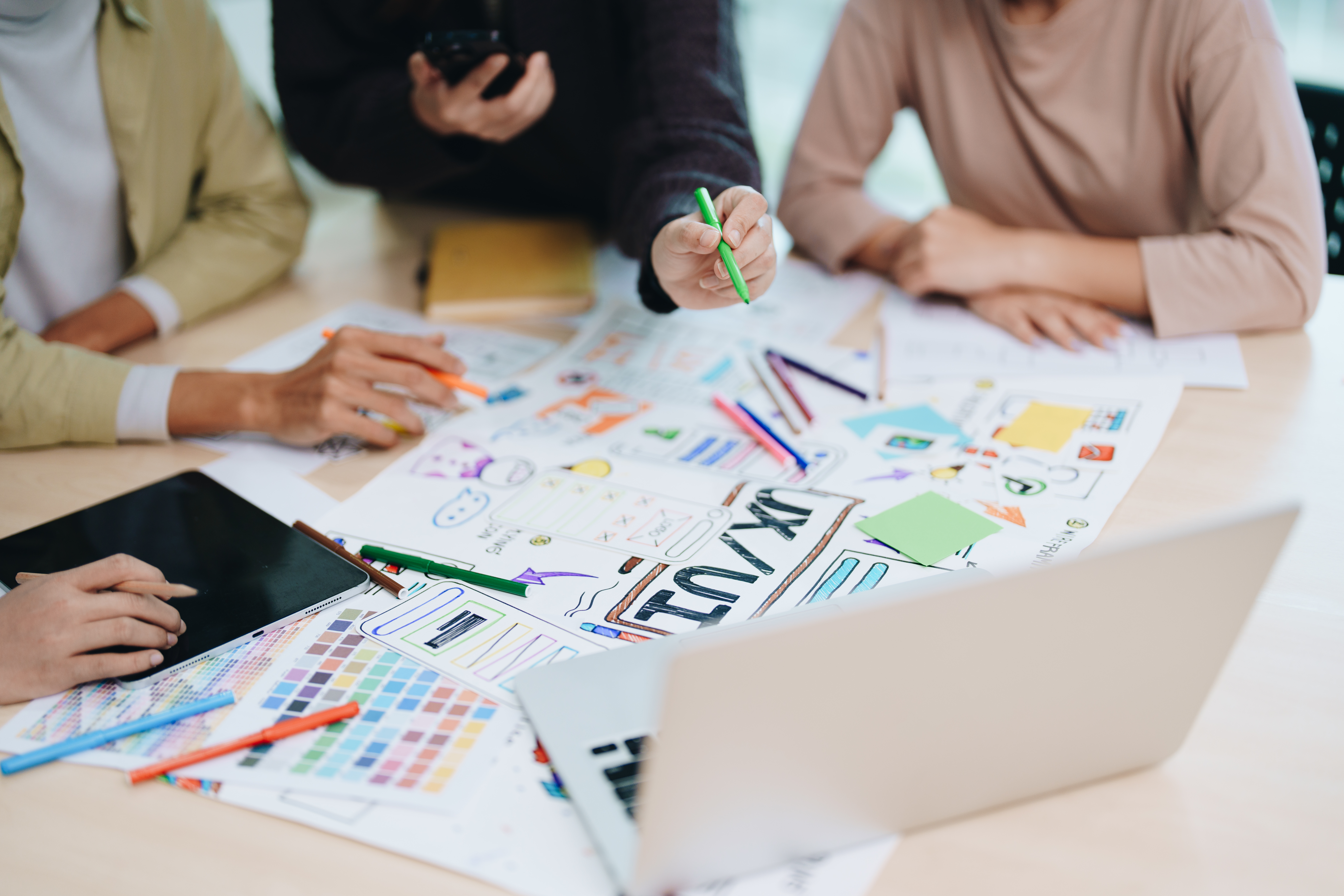 Reimagine Your Brand: The Power of a Strategic Redesign 3 team of creative web graphic designer planning fo 9f2089a9e031183cded8