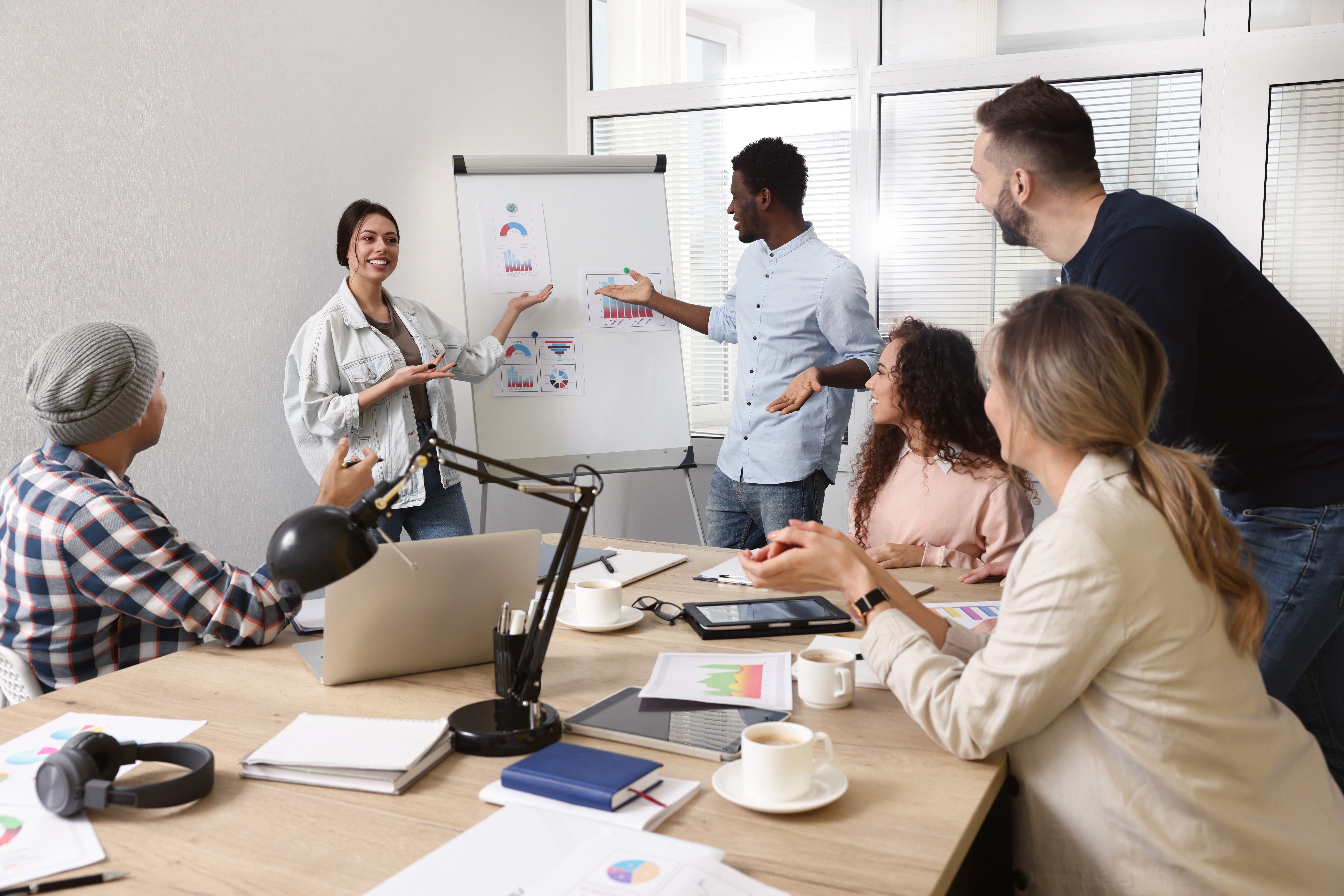 team of employees working together in office star 3fb488b7b86b7f417d98