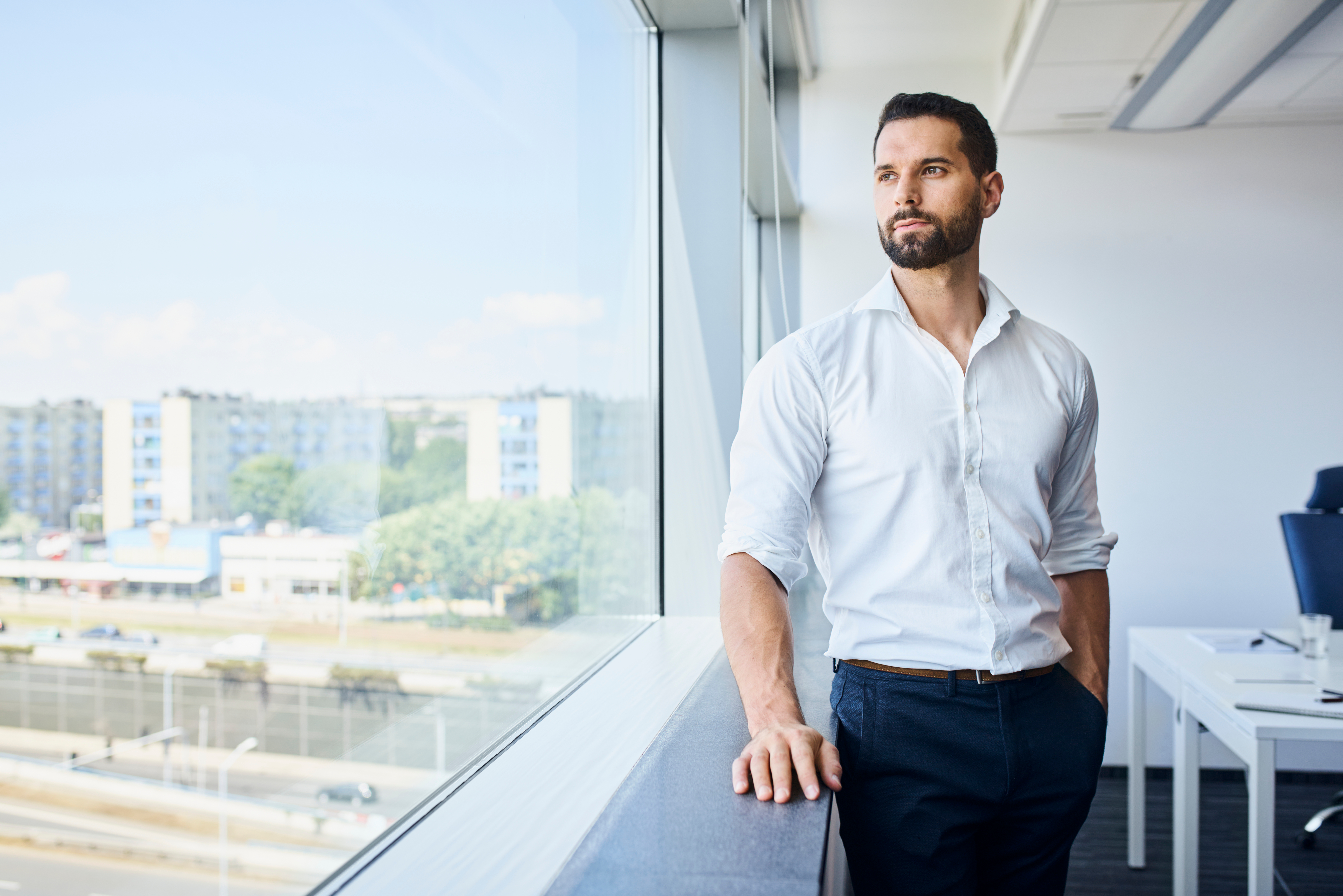 Featured image: Thoughtful handsome businessman at work standing a-666e149c329d50395123