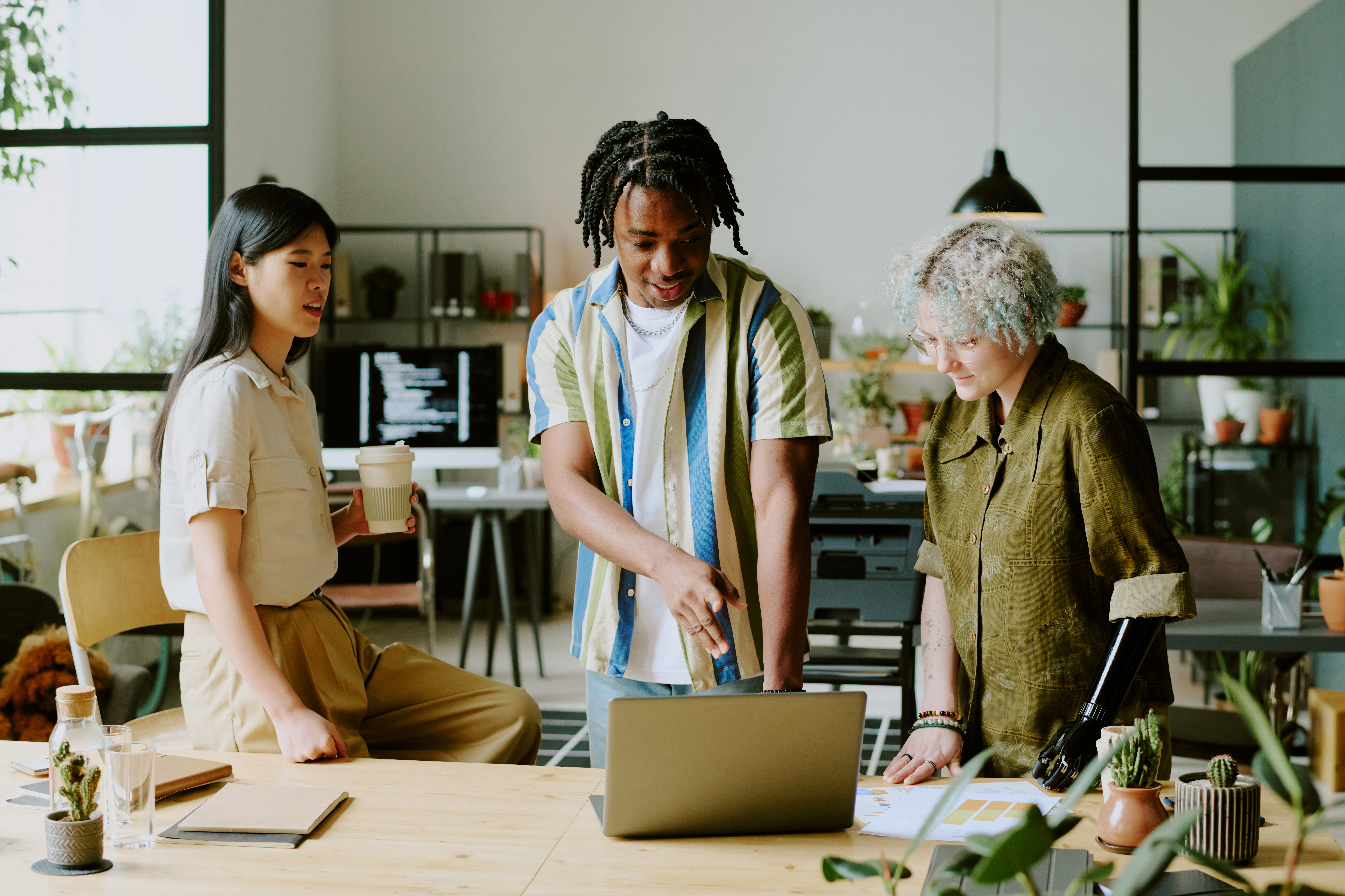 three diverse managers coworking in office 955c7b06bbfeeb05d5c8